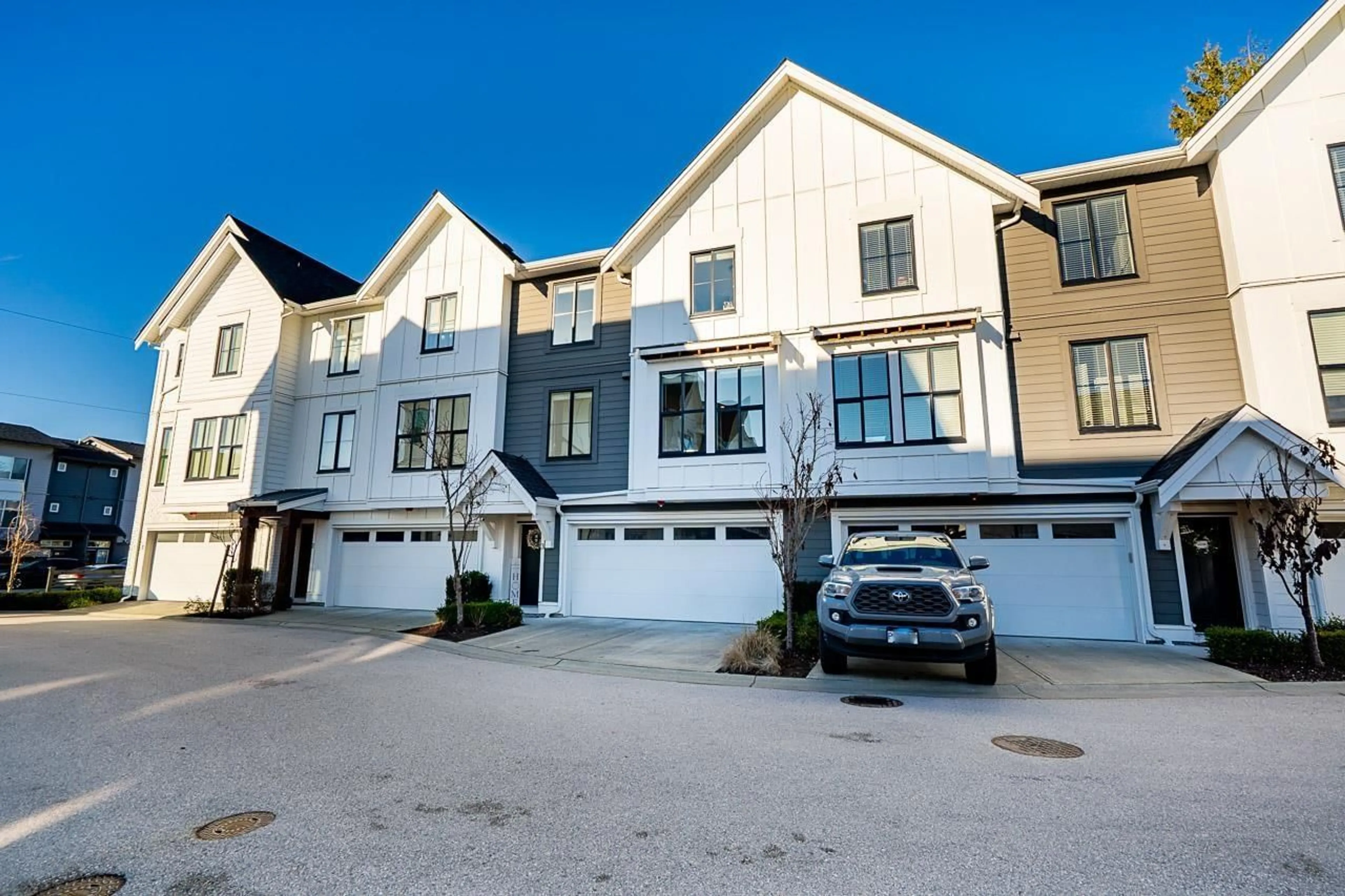 A pic from outside/outdoor area/front of a property/back of a property/a pic from drone, street for 3 - 8450 204 STREET, Langley British Columbia V2Y2C2