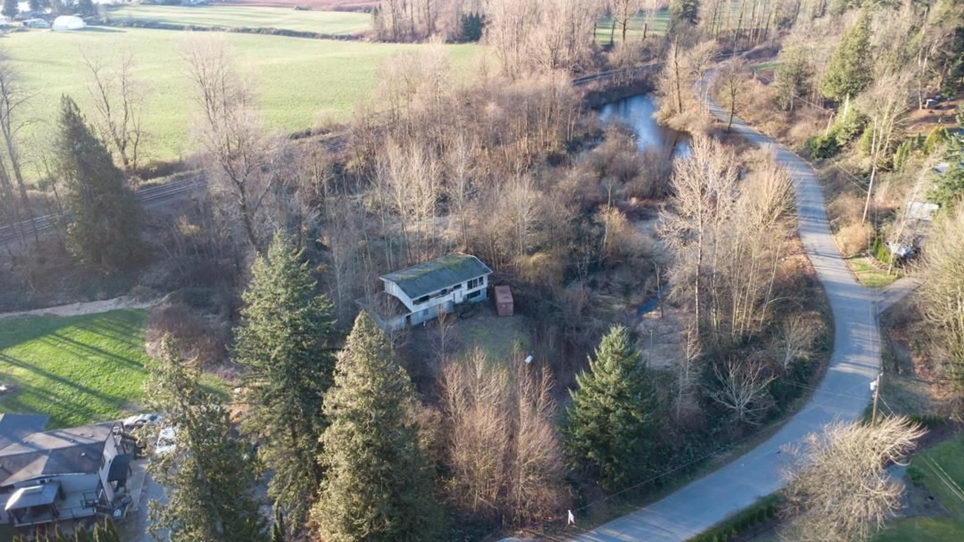 A pic from outside/outdoor area/front of a property/back of a property/a pic from drone, water/lake/river/ocean view for 41330 NORTH NICOMEN ROAD, Mission British Columbia V0M1G0
