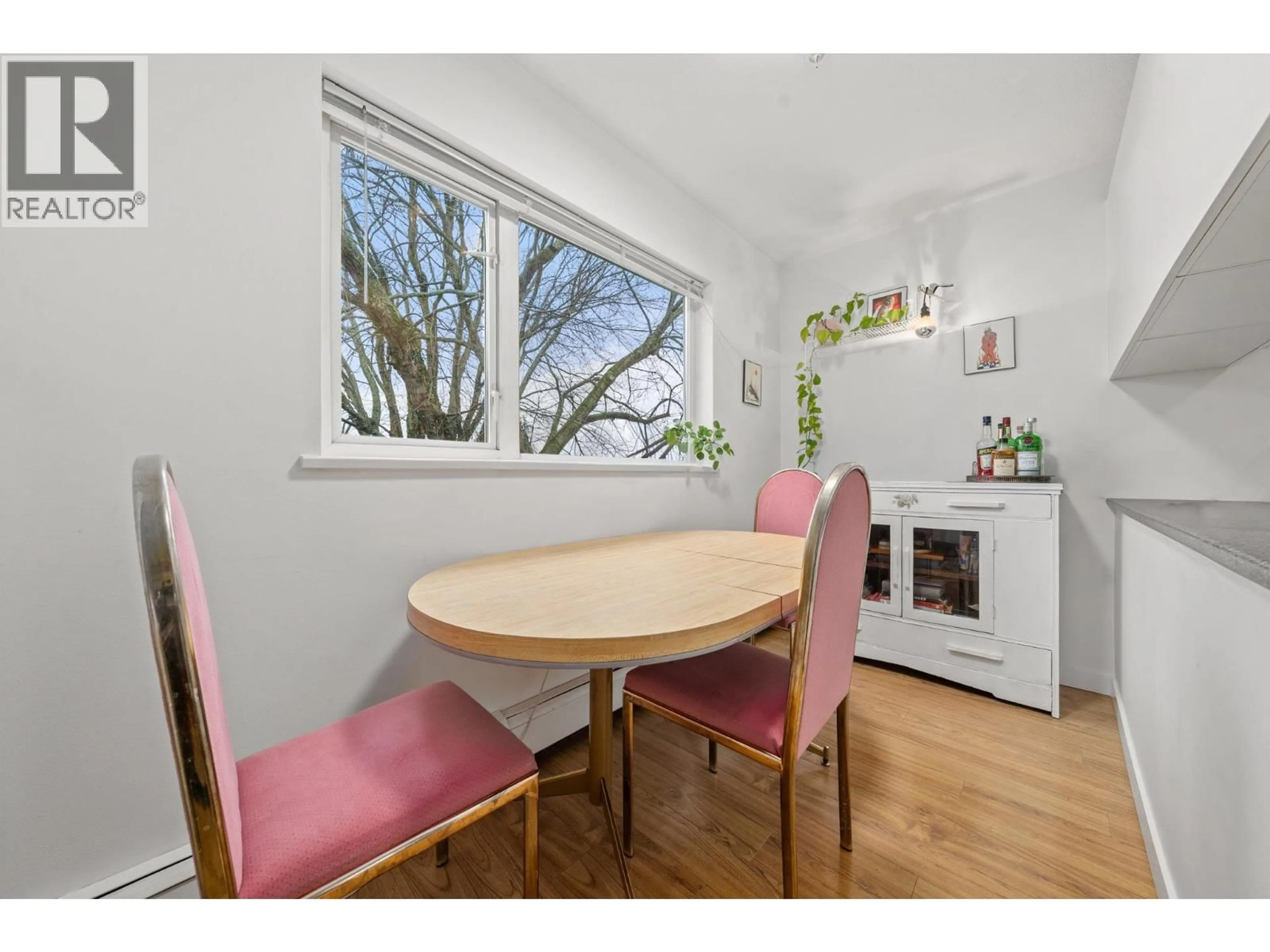 Dining room, wood/laminate floor for 401 - 33 TEMPLETON DRIVE, Vancouver British Columbia V5L3C9