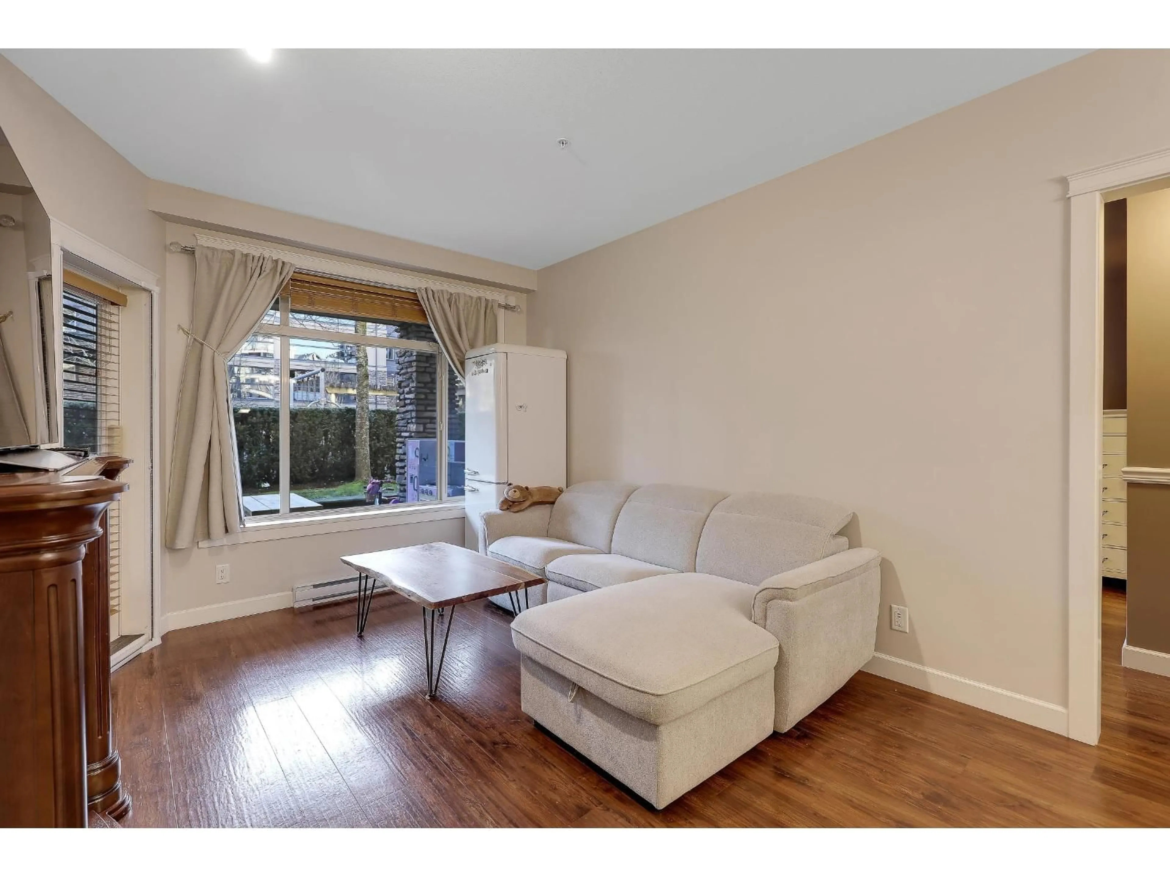 Living room with furniture, wood/laminate floor for 155 - 8258 207A STREET, Langley British Columbia V2Y0N3