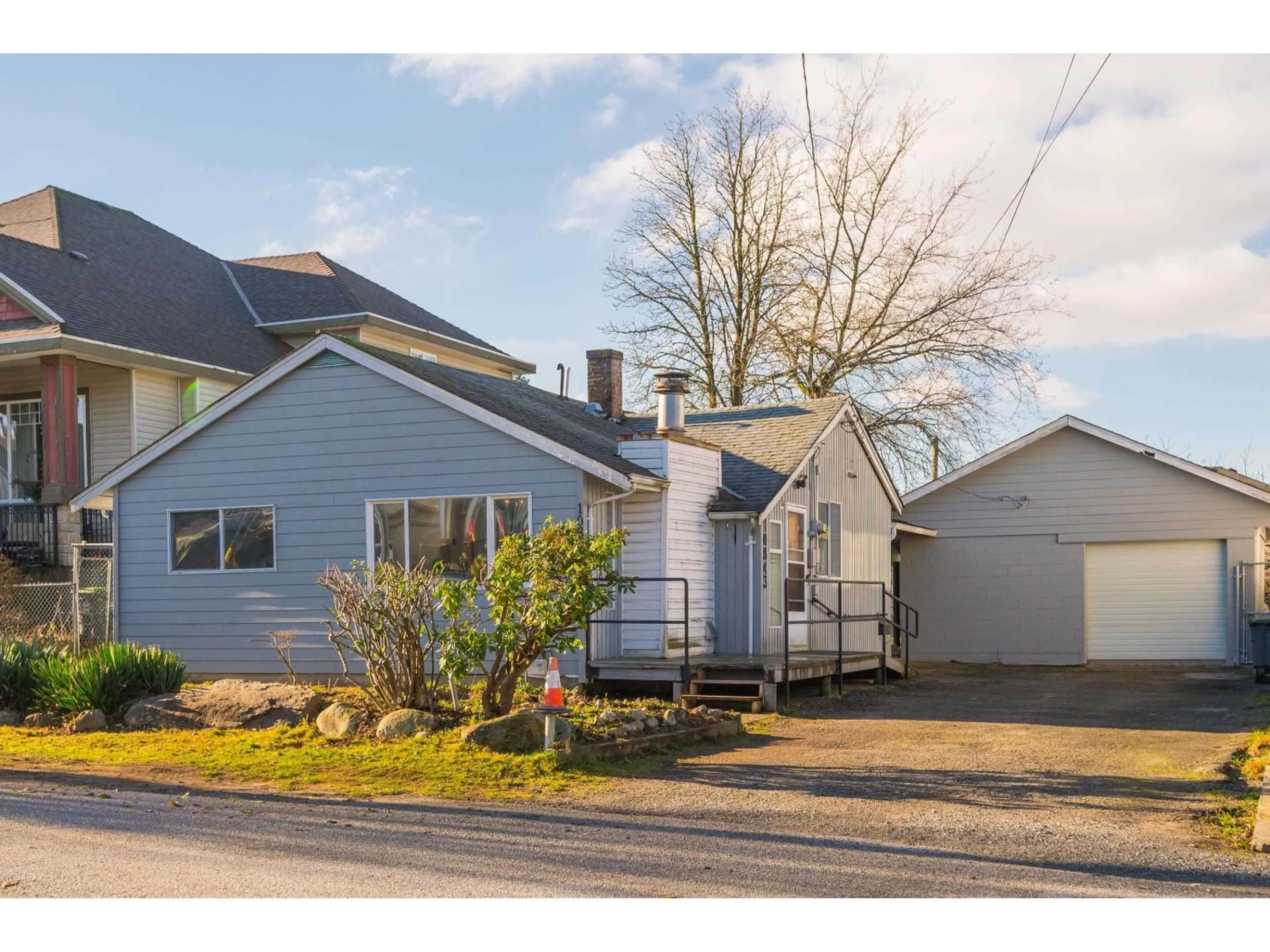 Home with vinyl exterior material, street for 10843 130 STREET, Surrey British Columbia V3T3L9