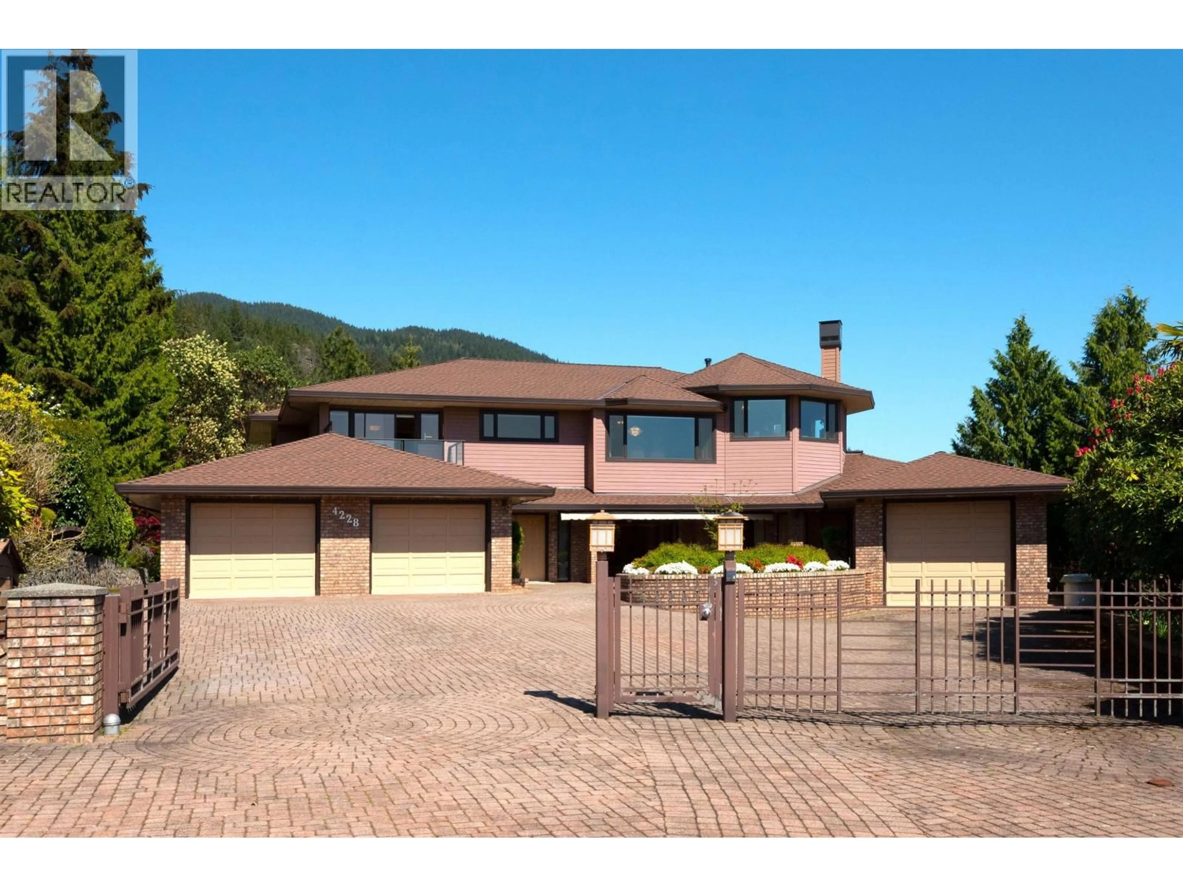 Home with brick exterior material, mountain view for 4228 ROCKRIDGE CRESCENT, West Vancouver British Columbia V7W1B1