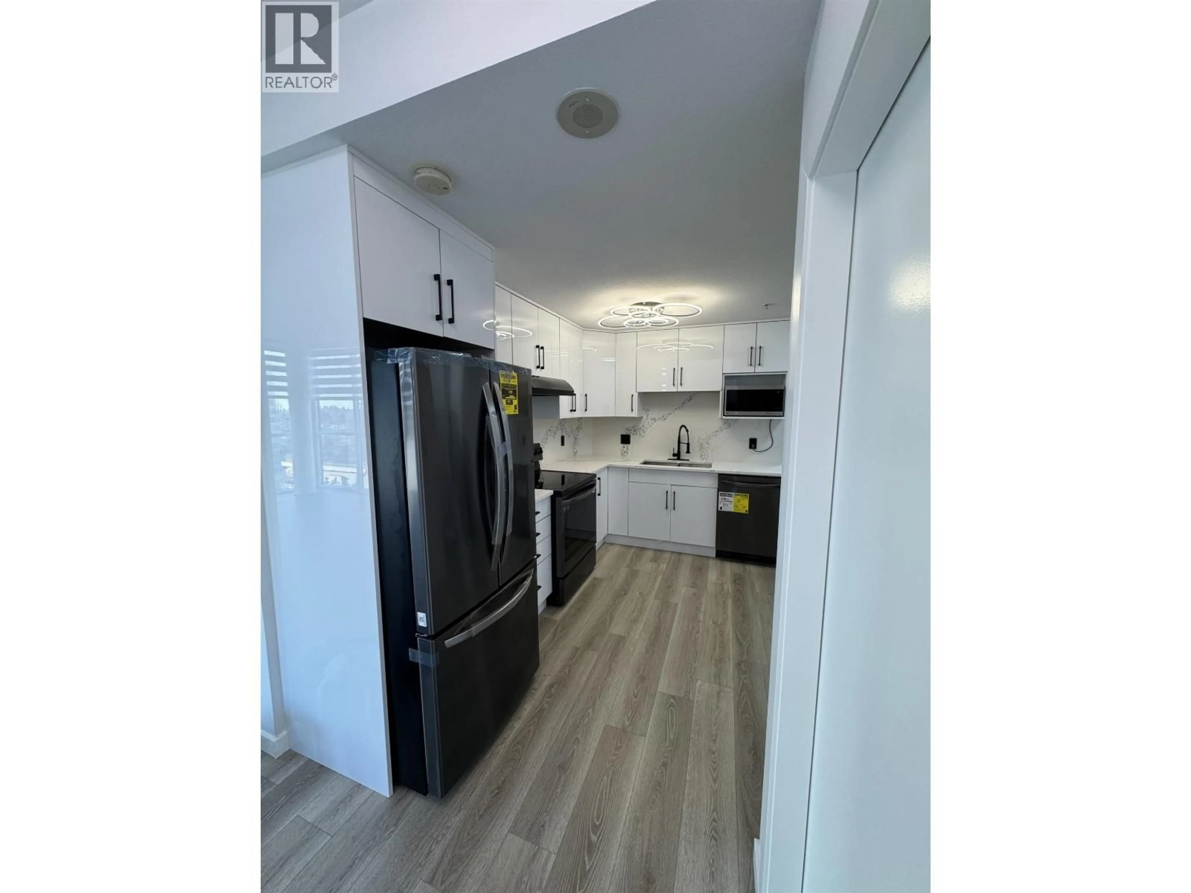Open concept kitchen, wood/laminate floor for 804 - 6133 BUSWELL STREET, Richmond British Columbia V6Y0B2
