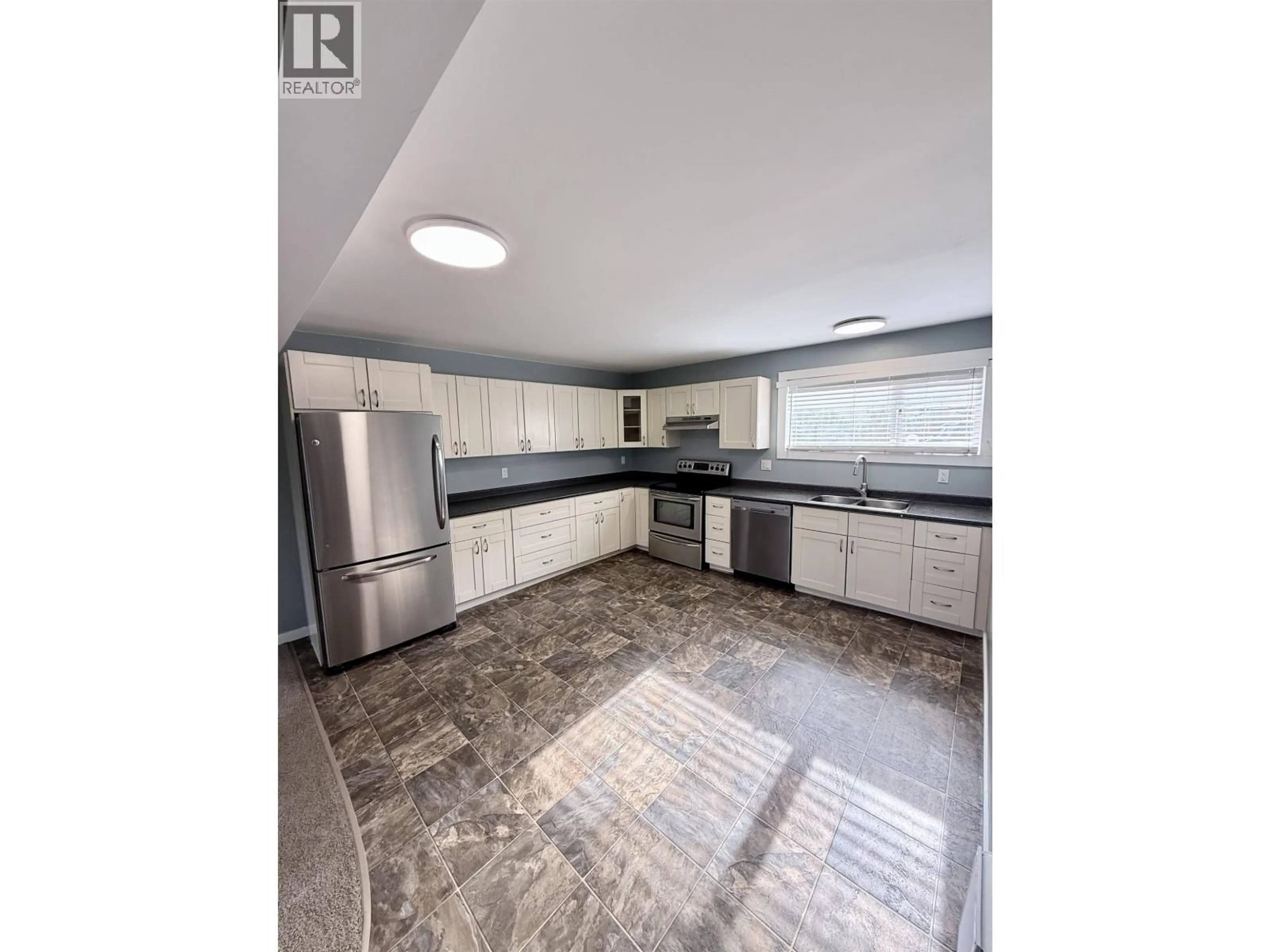 Open concept kitchen, ceramic/tile floor for 585 GILLETT STREET, Prince George British Columbia V2M2T8