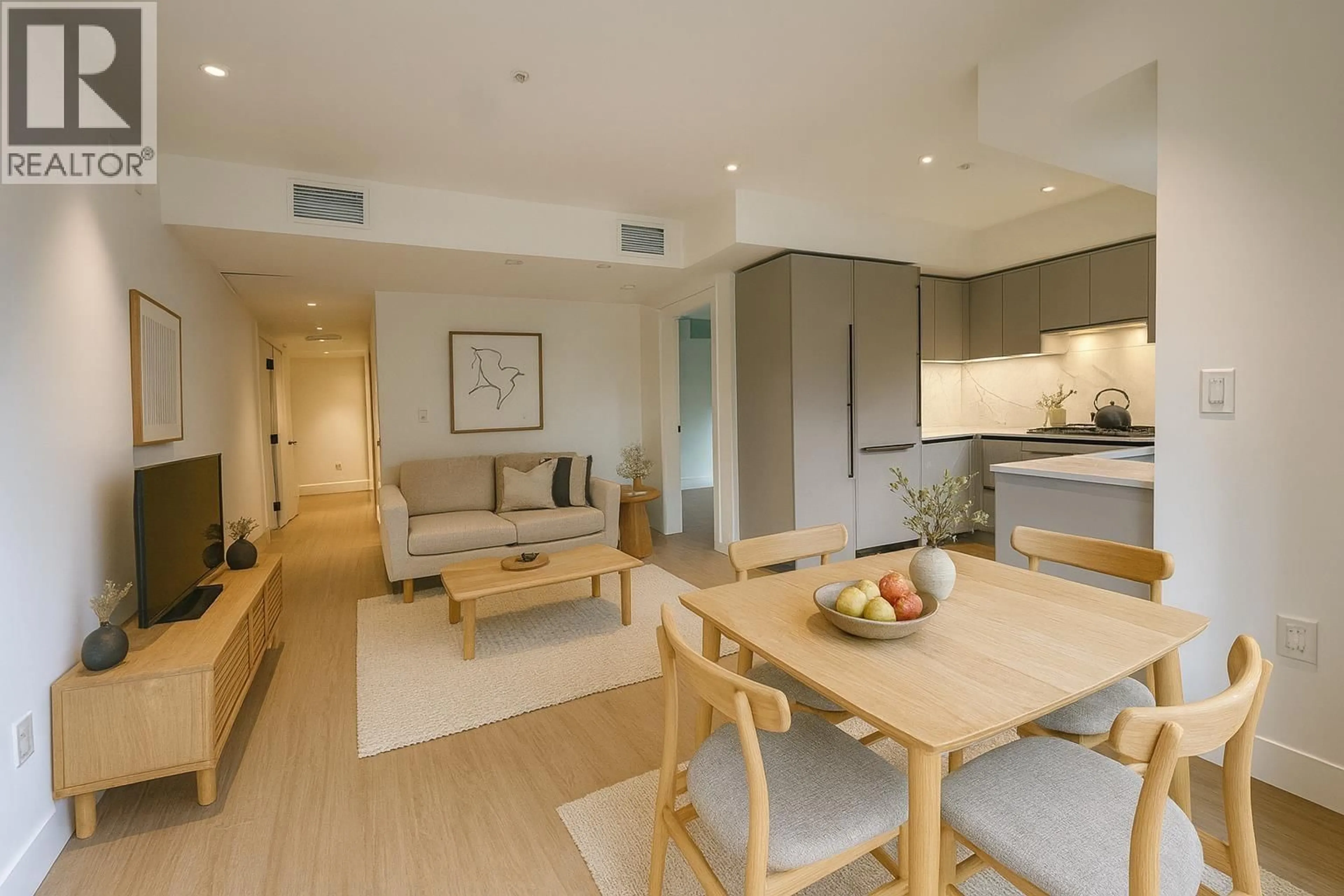 Living room with furniture, wood/laminate floor for 203 - 2235 BROADWAY, Vancouver British Columbia V5N0J5