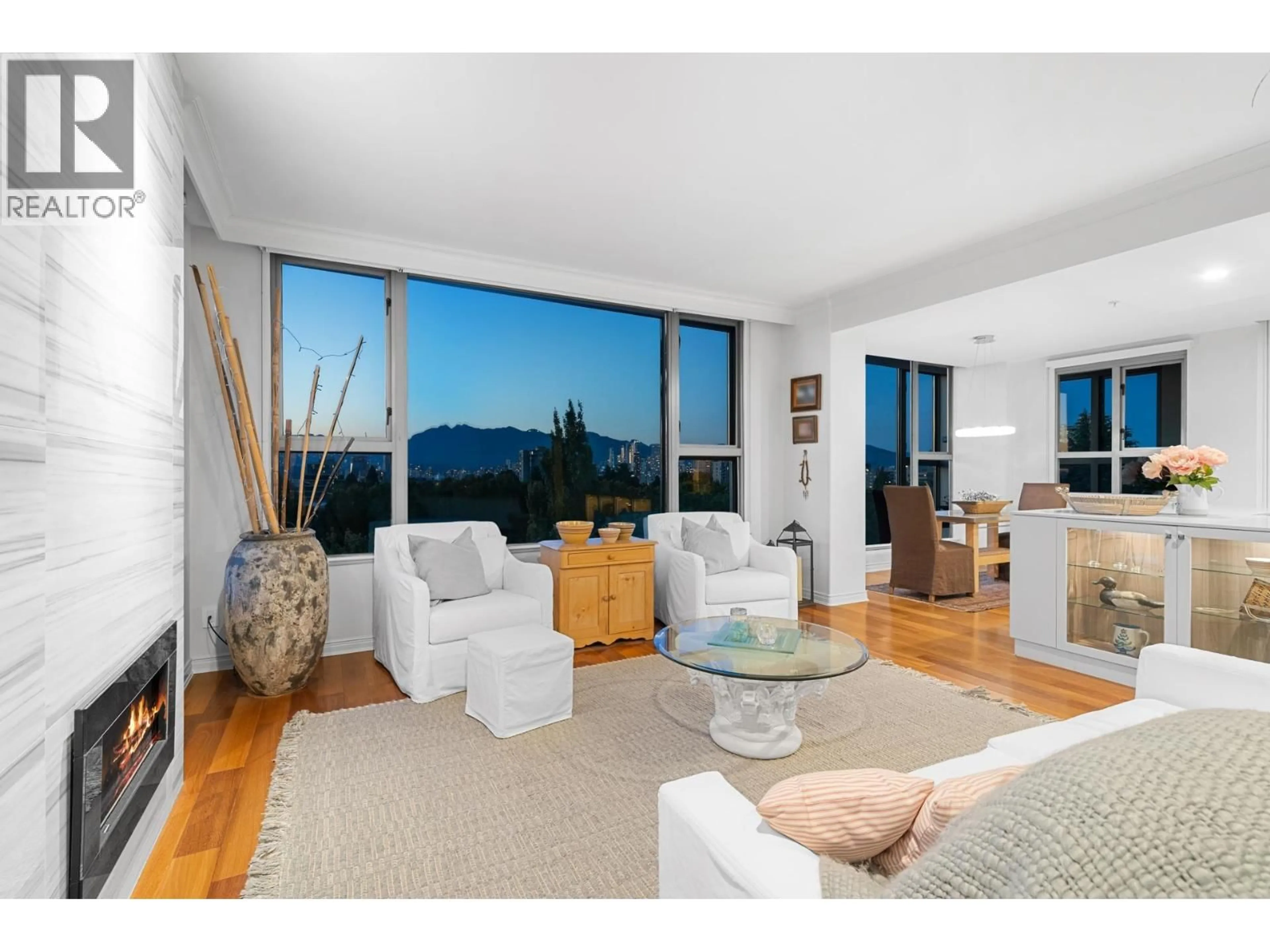 Living room with furniture, wood/laminate floor for 700 - 1788 13TH AVENUE, Vancouver British Columbia V6J2H1