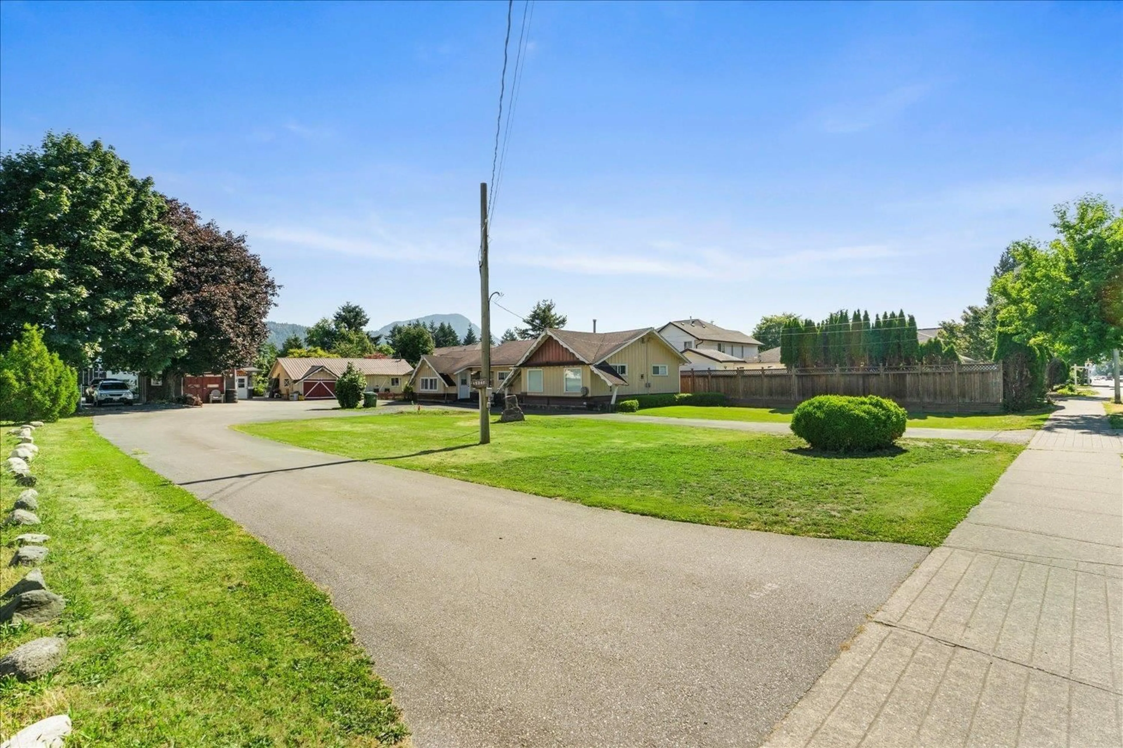 A pic from outside/outdoor area/front of a property/back of a property/a pic from drone, street for 45240 SOUTH SUMAS ROAD, Chilliwack British Columbia V2R1W9