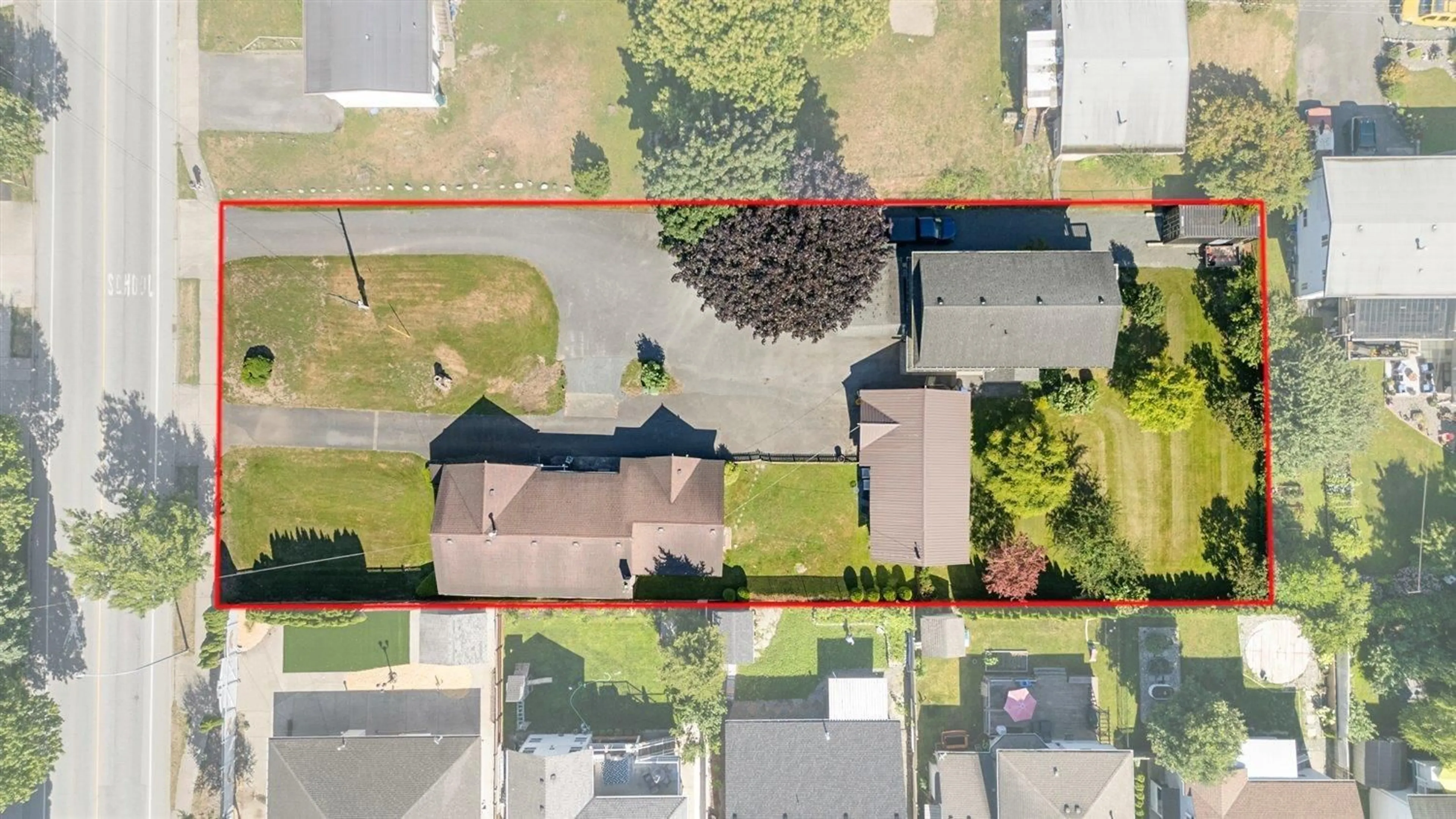 A pic from outside/outdoor area/front of a property/back of a property/a pic from drone, street for 45240 SOUTH SUMAS ROAD, Chilliwack British Columbia V2R1W9