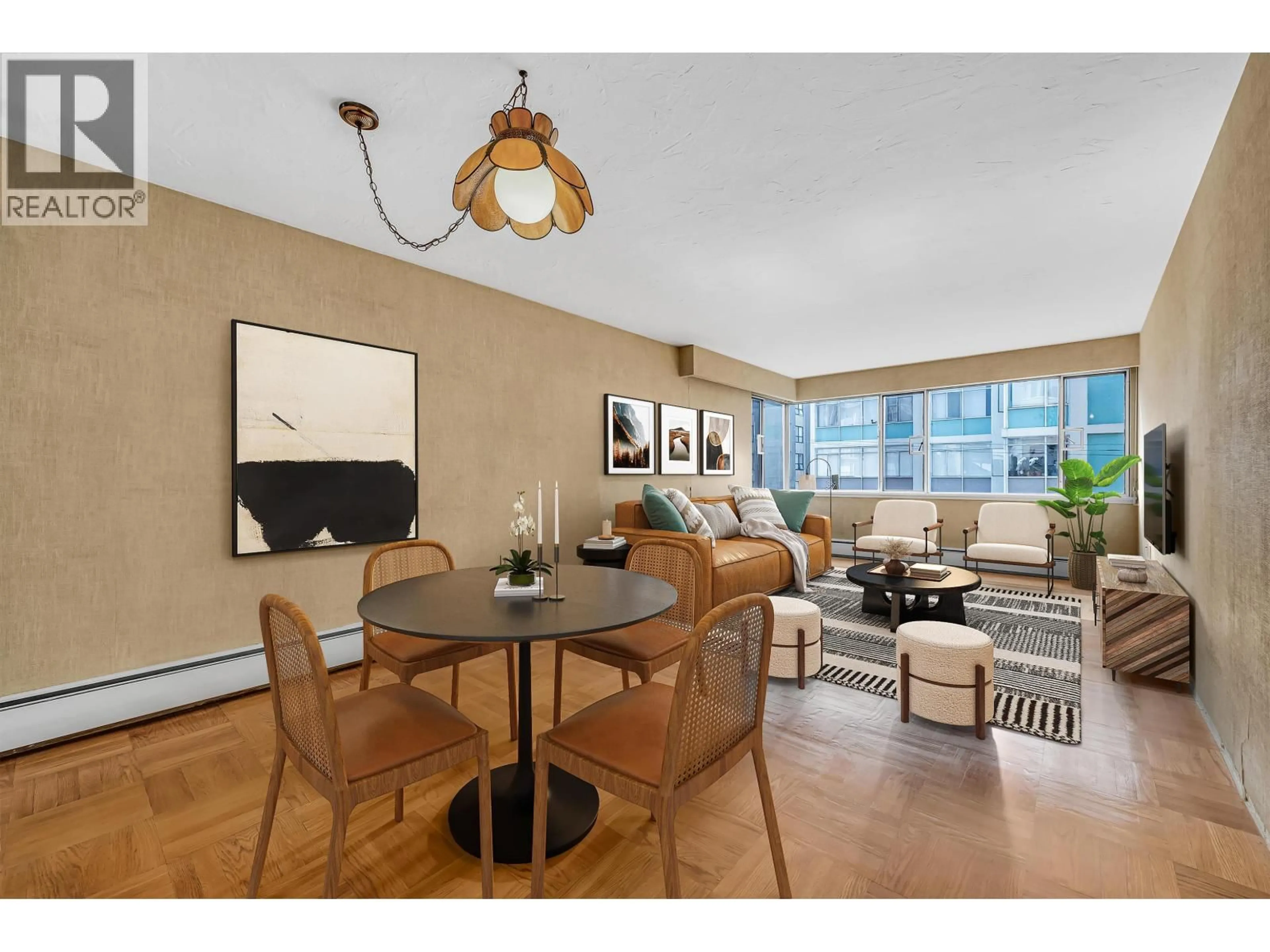 Living room with furniture, wood/laminate floor for 301 - 1050 CHILCO STREET, Vancouver British Columbia V6G2R8