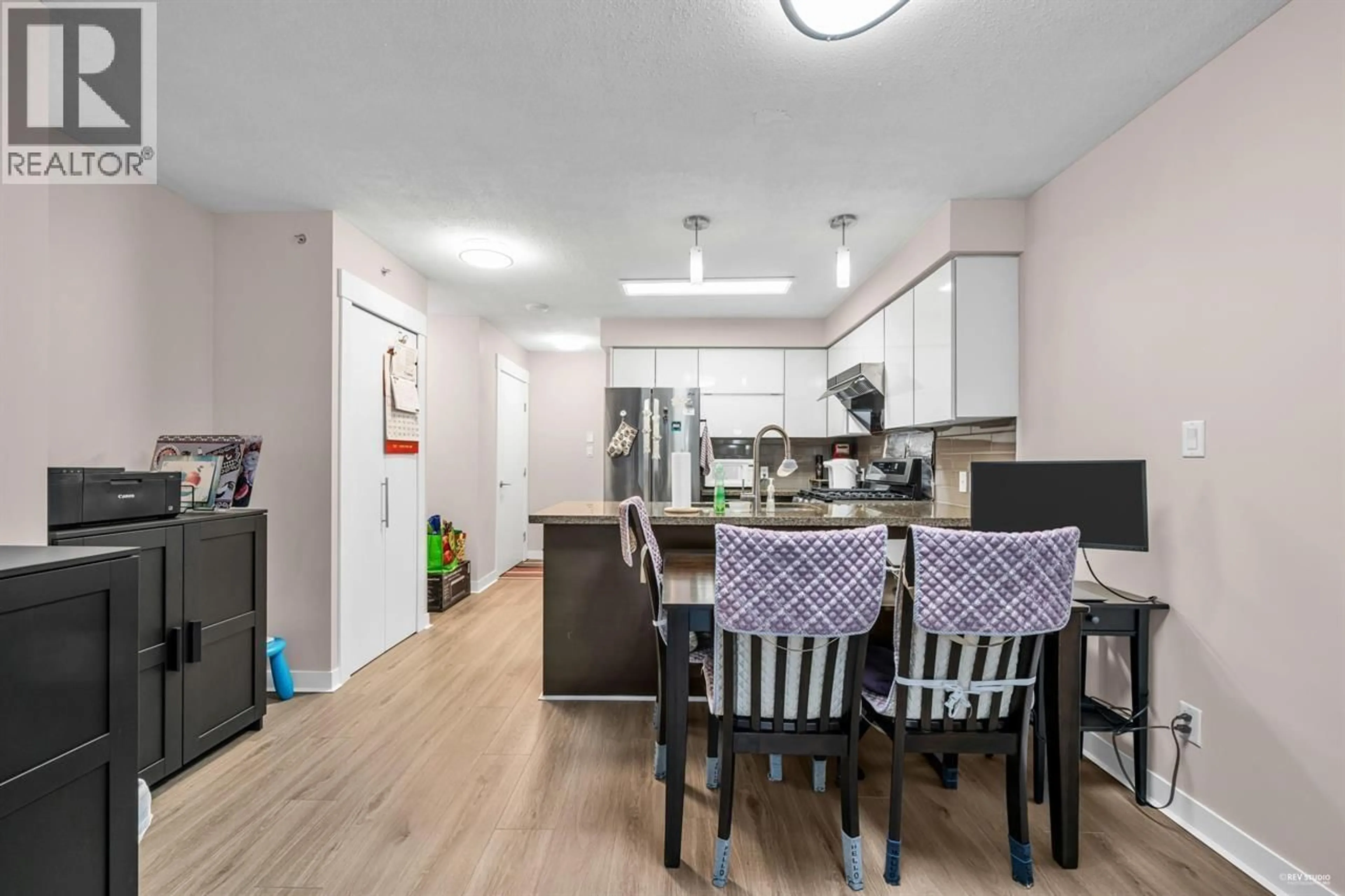 Open concept kitchen, wood/laminate floor for 509 - 6733 BUSWELL STREET, Richmond British Columbia V6Y0E3