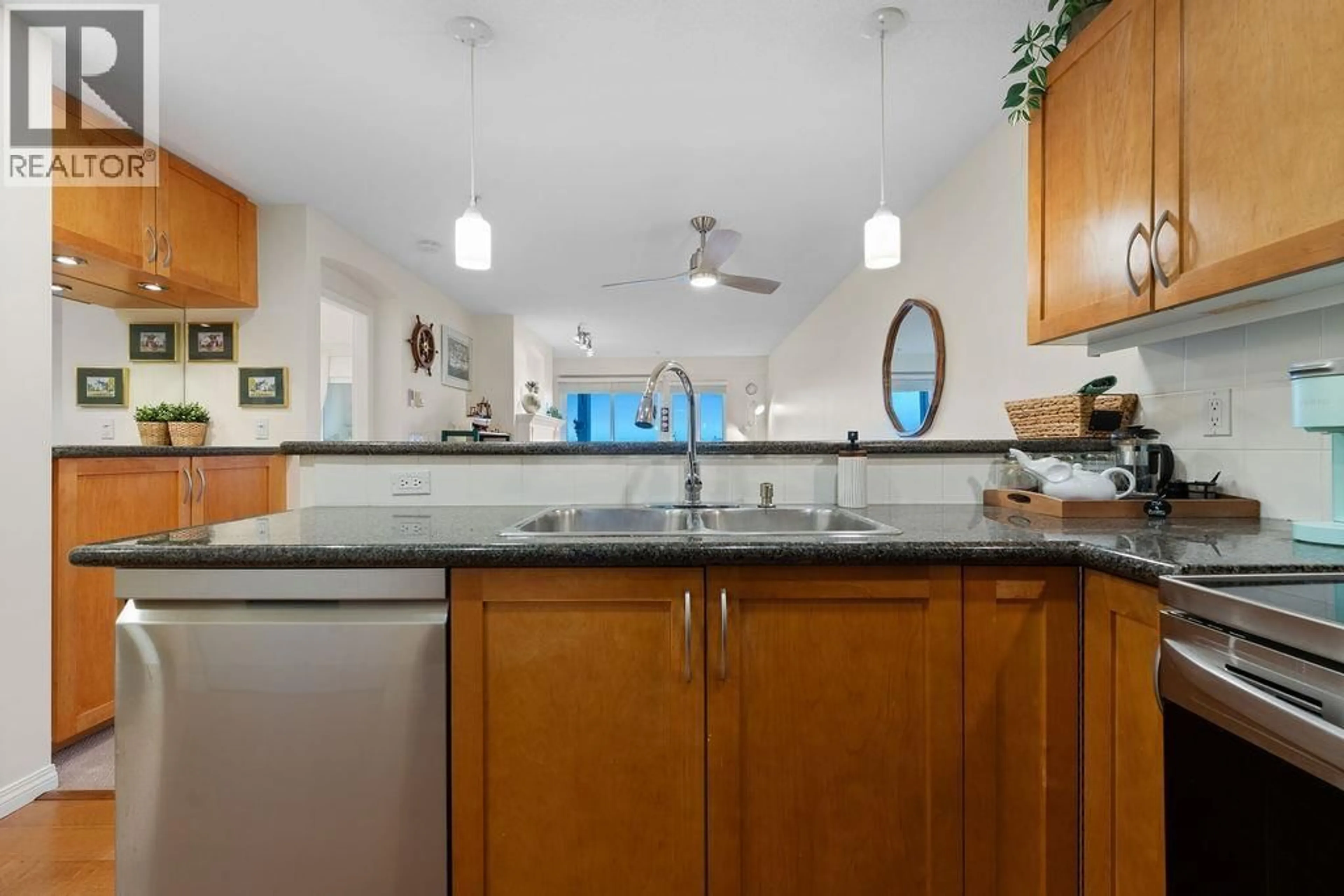 Open concept kitchen, ceramic/tile floor for 308 - 333 1ST STREET, North Vancouver British Columbia V7L4W9