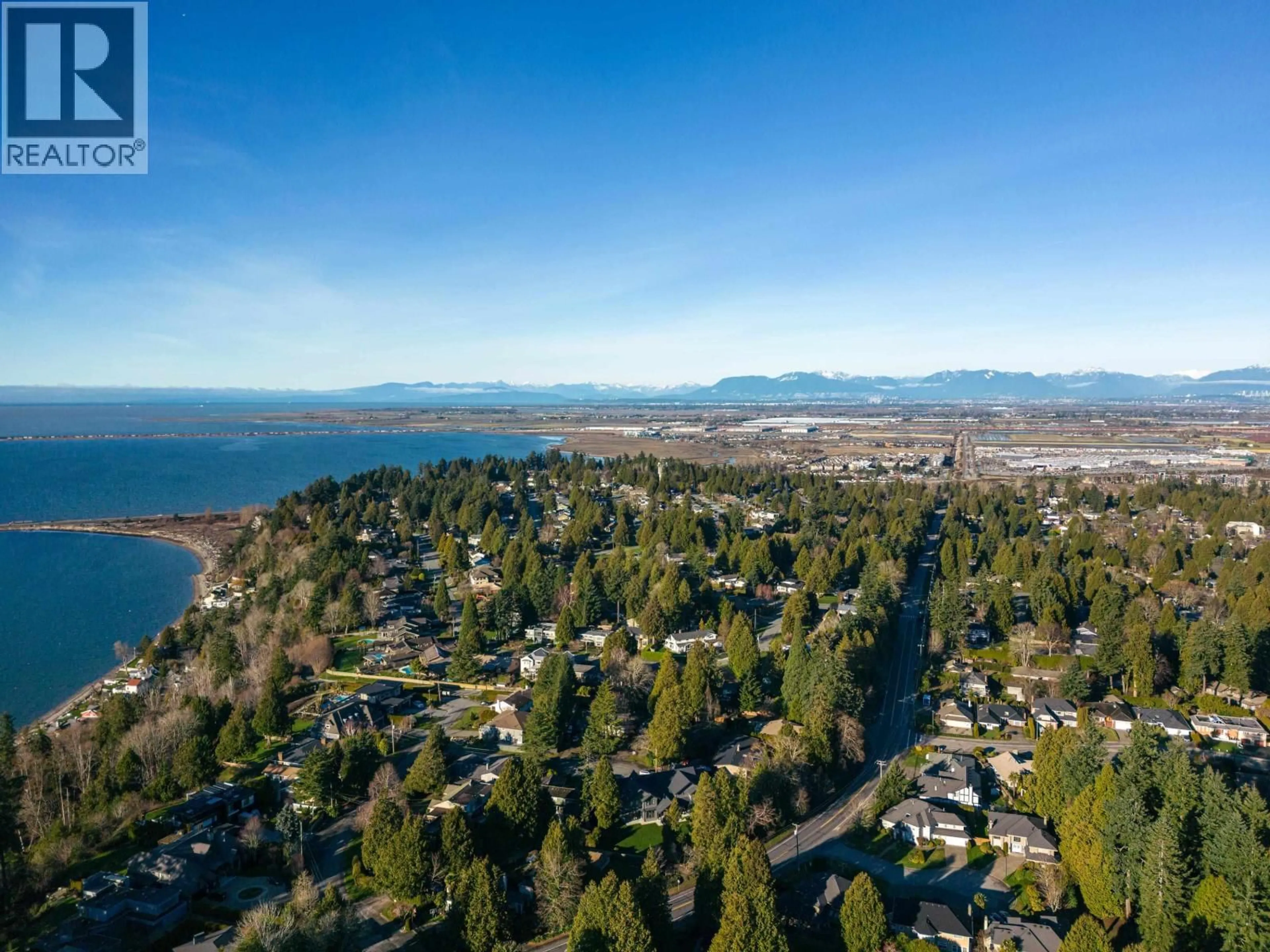 A pic from outside/outdoor area/front of a property/back of a property/a pic from drone, mountain view for 4857 DOGWOOD DRIVE, Delta British Columbia V4M1M3