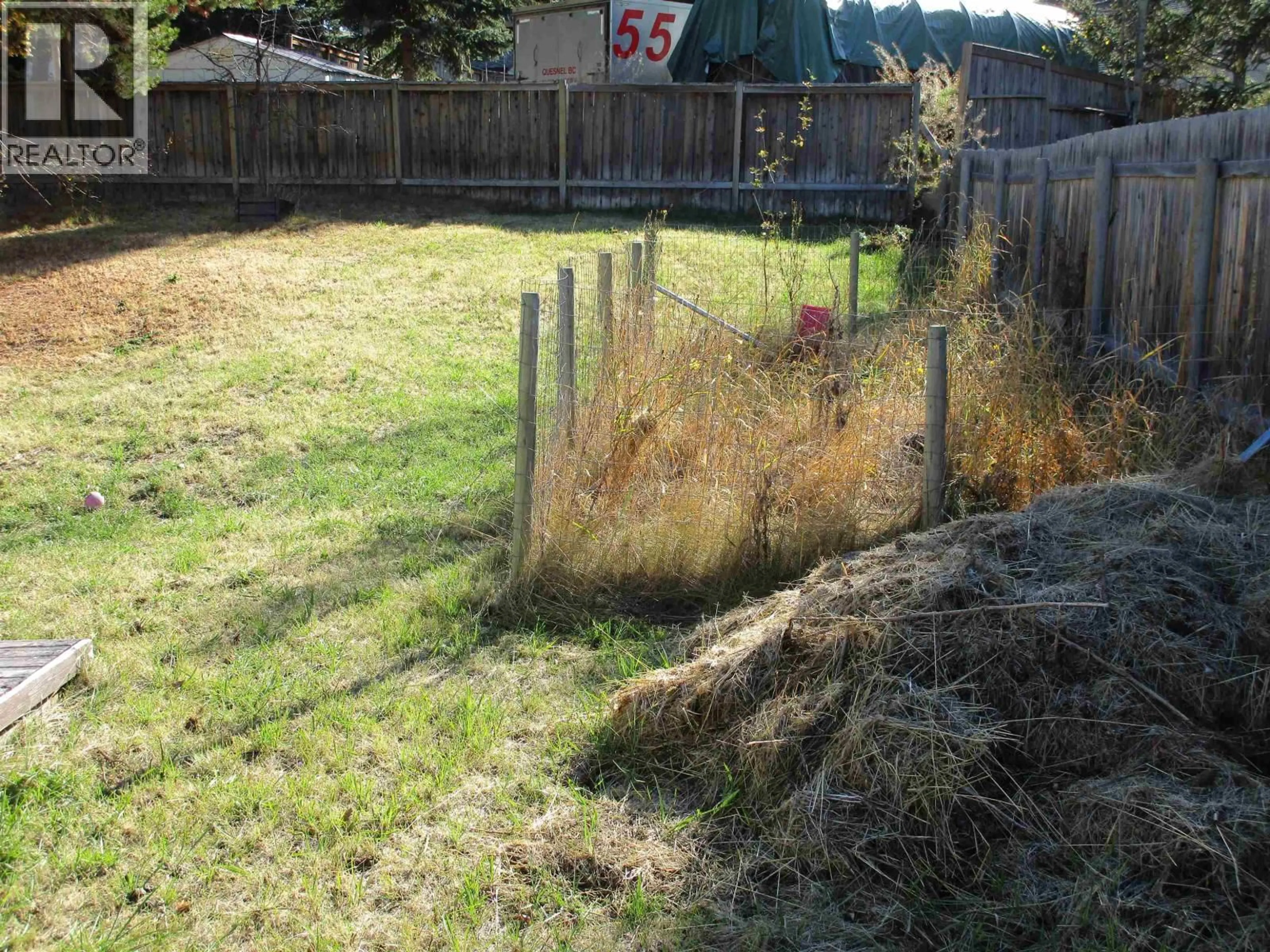 A pic from outside/outdoor area/front of a property/back of a property/a pic from drone, street for 908 JENS STREET, 100 Mile House British Columbia V0K2E0