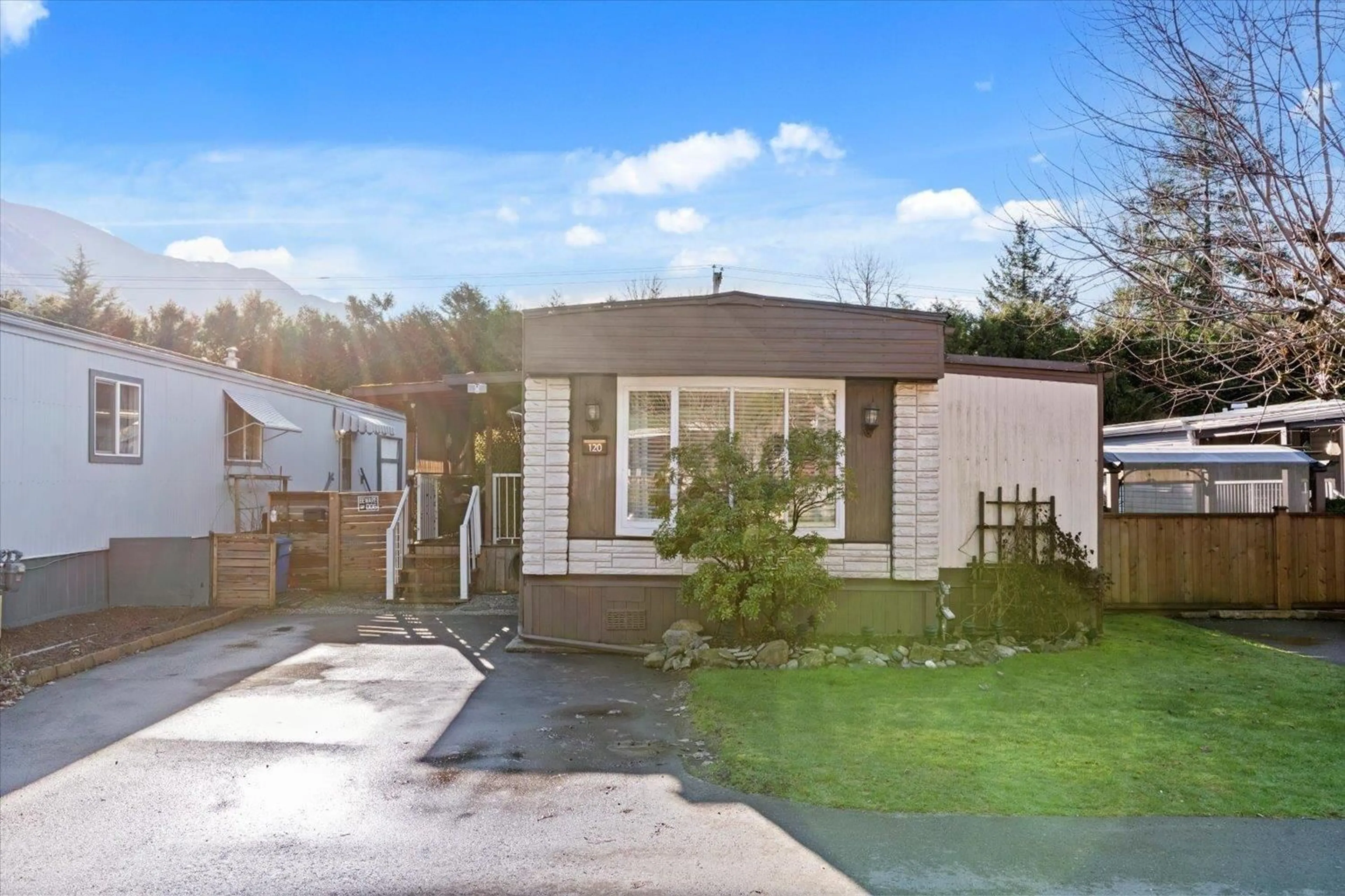 A pic from outside/outdoor area/front of a property/back of a property/a pic from drone, street for 120 - 46511 CHILLIWACK LAKE ROAD, Chilliwack British Columbia V2R3S4