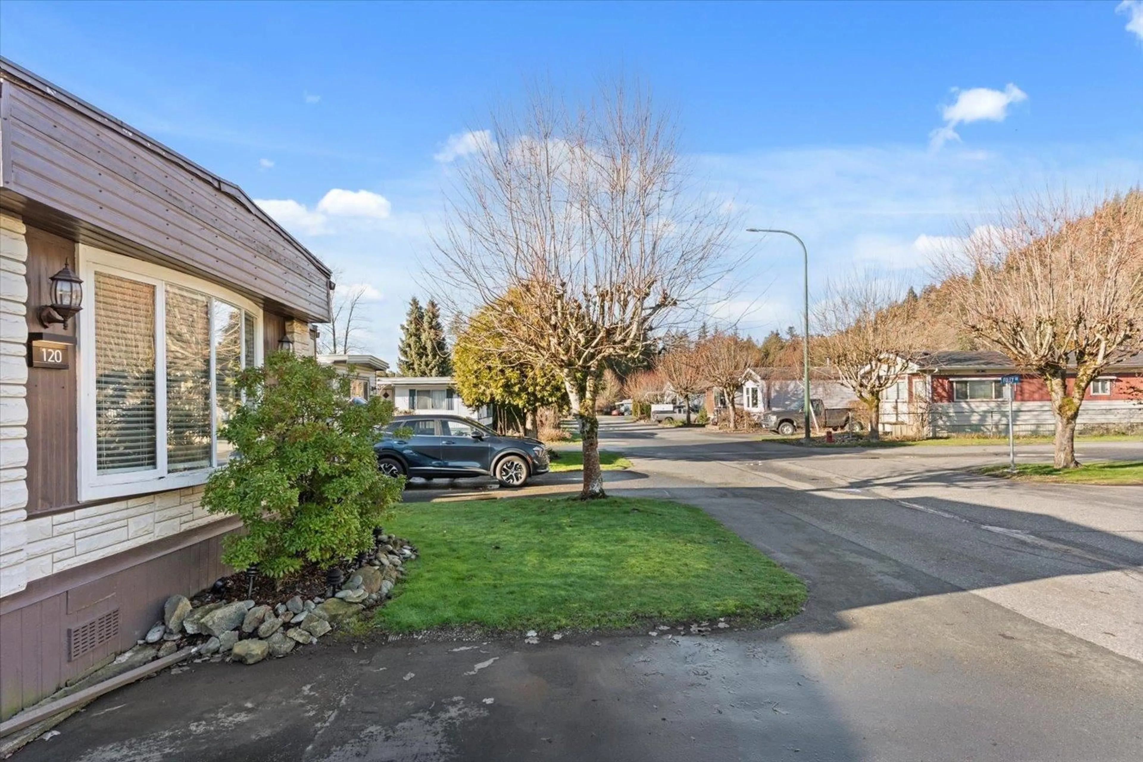 A pic from outside/outdoor area/front of a property/back of a property/a pic from drone, street for 120 - 46511 CHILLIWACK LAKE ROAD, Chilliwack British Columbia V2R3S4