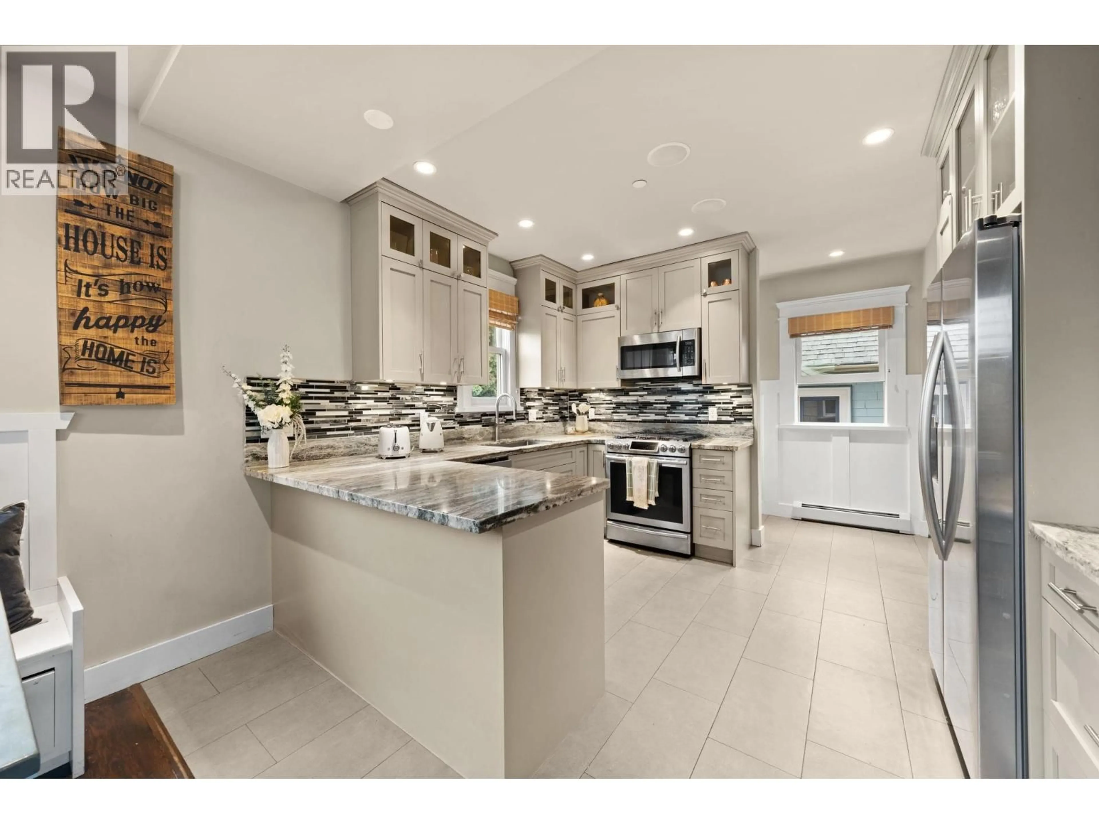 Open concept kitchen, ceramic/tile floor for 2576 OXFORD STREET, Vancouver British Columbia V5K1N1