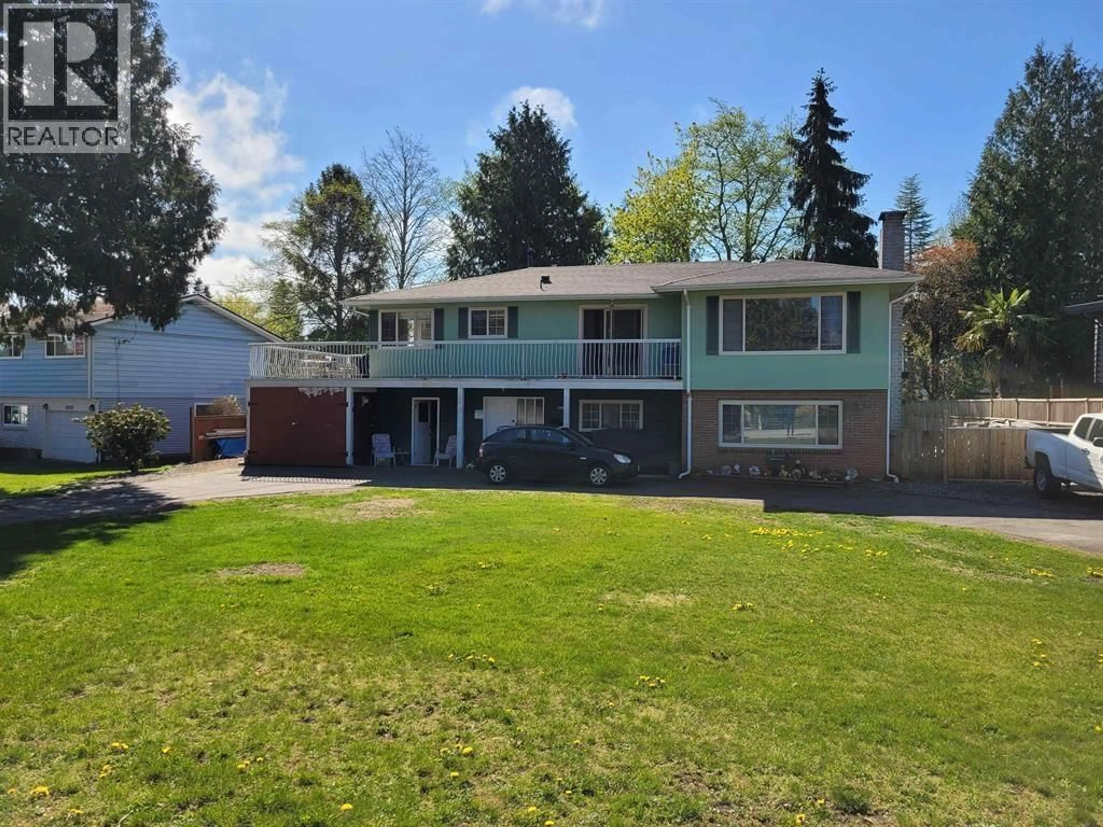 A pic from outside/outdoor area/front of a property/back of a property/a pic from drone, street for 4984 10A AVENUE, Delta British Columbia V4M1X8