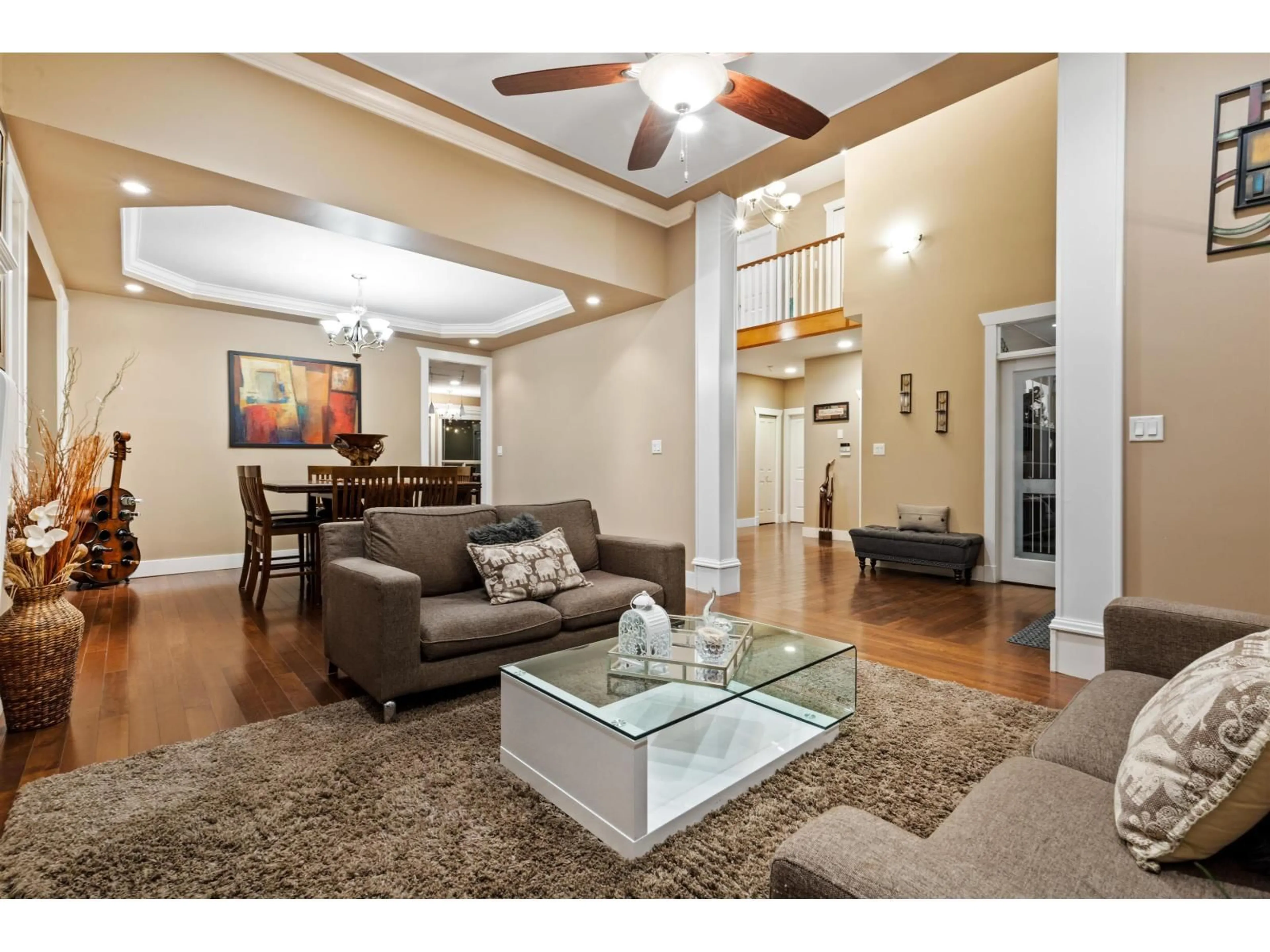 Living room with furniture, wood/laminate floor for 8741 163A STREET, Surrey British Columbia V4N1C3