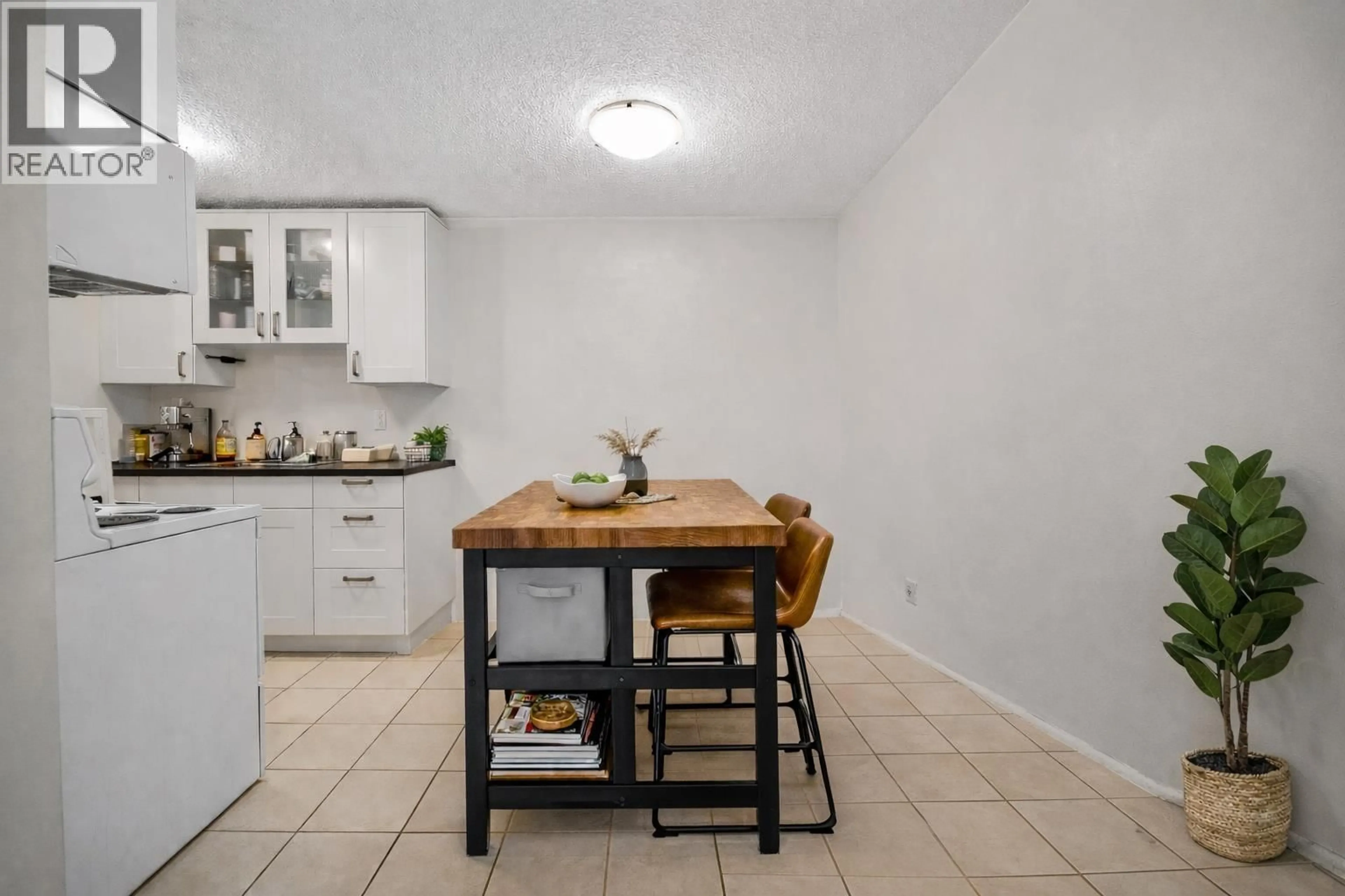 Standard kitchen, ceramic/tile floor for 229 - 2033 TRIUMPH STREET, Vancouver British Columbia V5L4X3