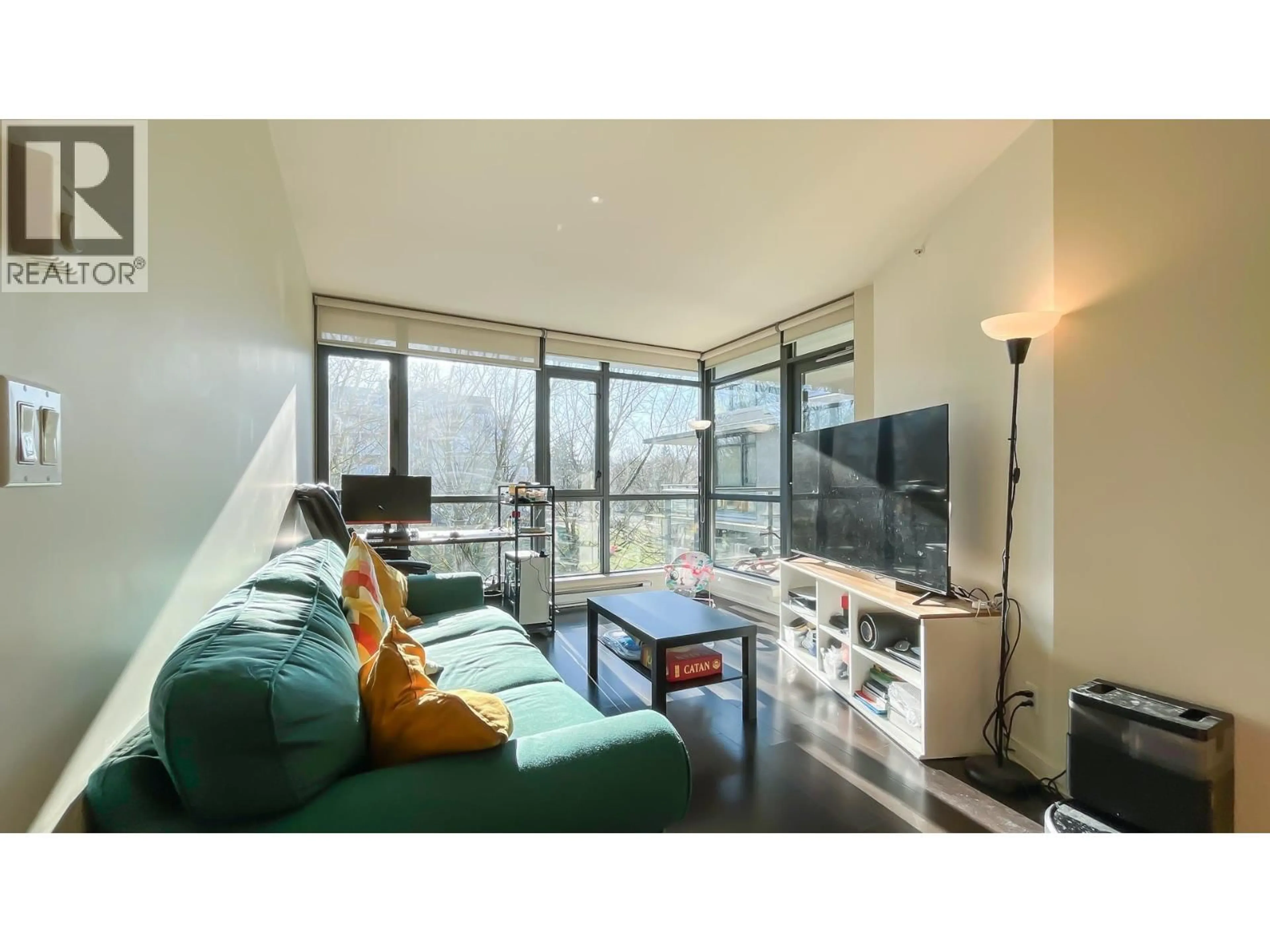 Living room with furniture, wood/laminate floor for 303 - 750 12TH AVENUE, Vancouver British Columbia V5Z0A3