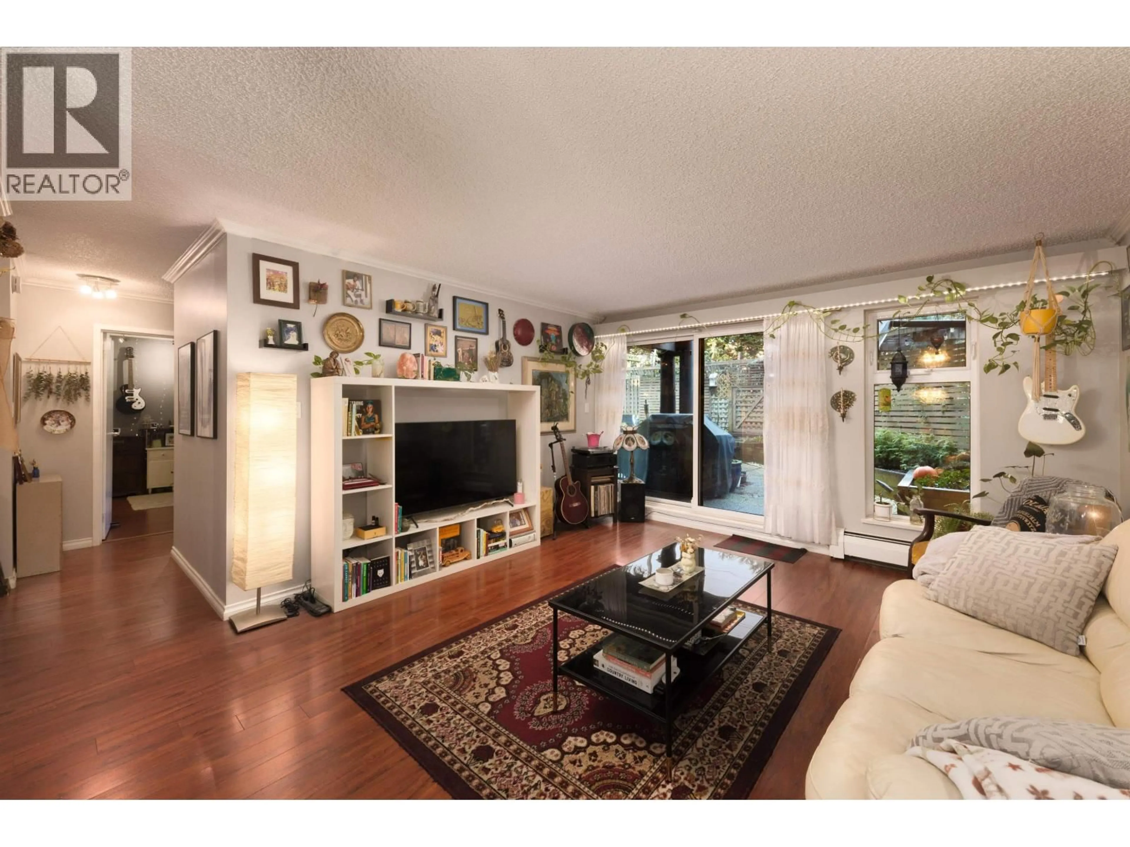 Living room with furniture, wood/laminate floor for 221 - 7377 SALISBURY AVENUE, Burnaby British Columbia V5E4B2