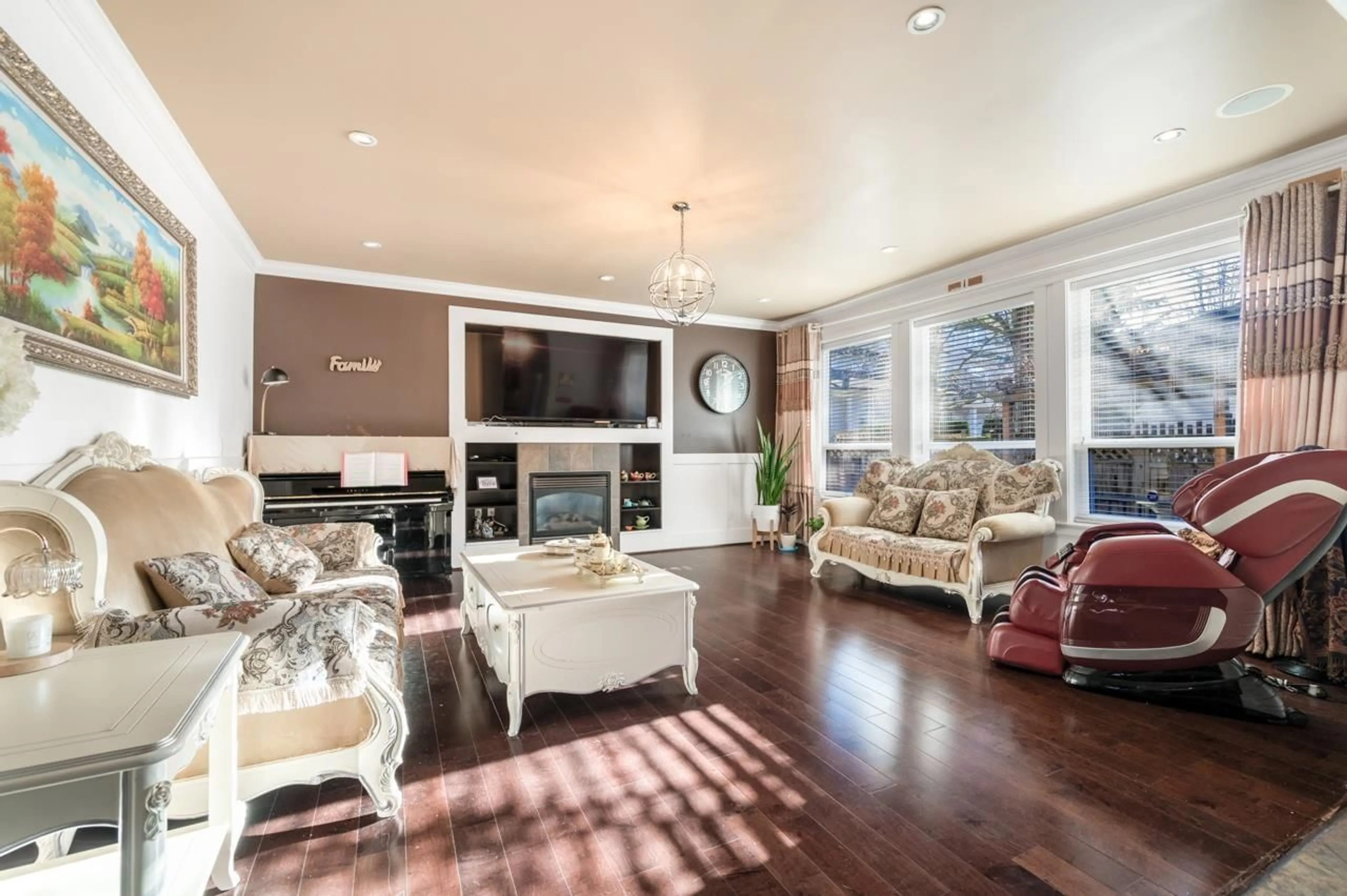 Living room with furniture, wood/laminate floor for 16334 25 AVENUE, Surrey British Columbia V3Z6S1