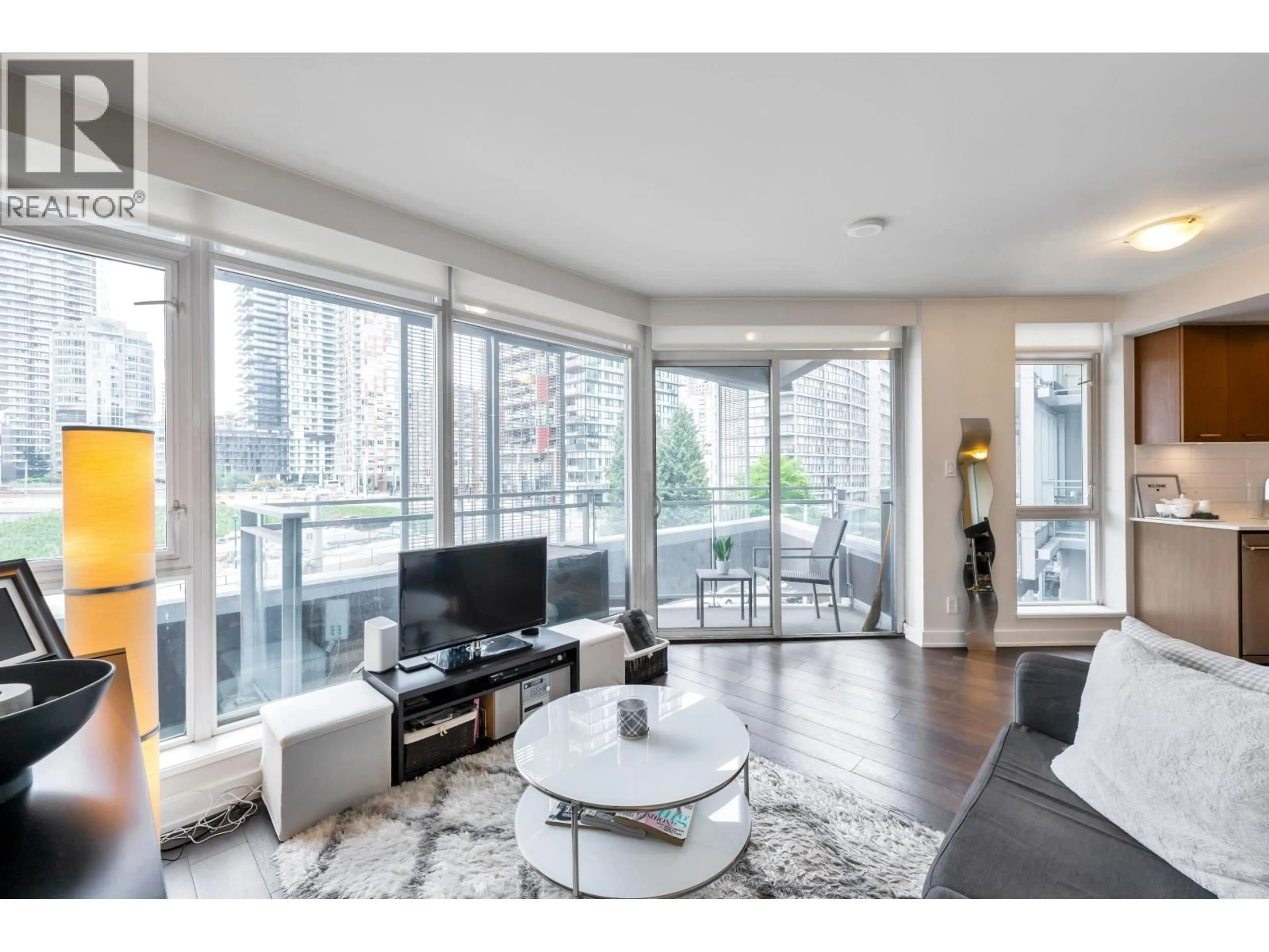Living room with furniture, wood/laminate floor for 607 - 1372 SEYMOUR STREET, Vancouver British Columbia V6B0L1