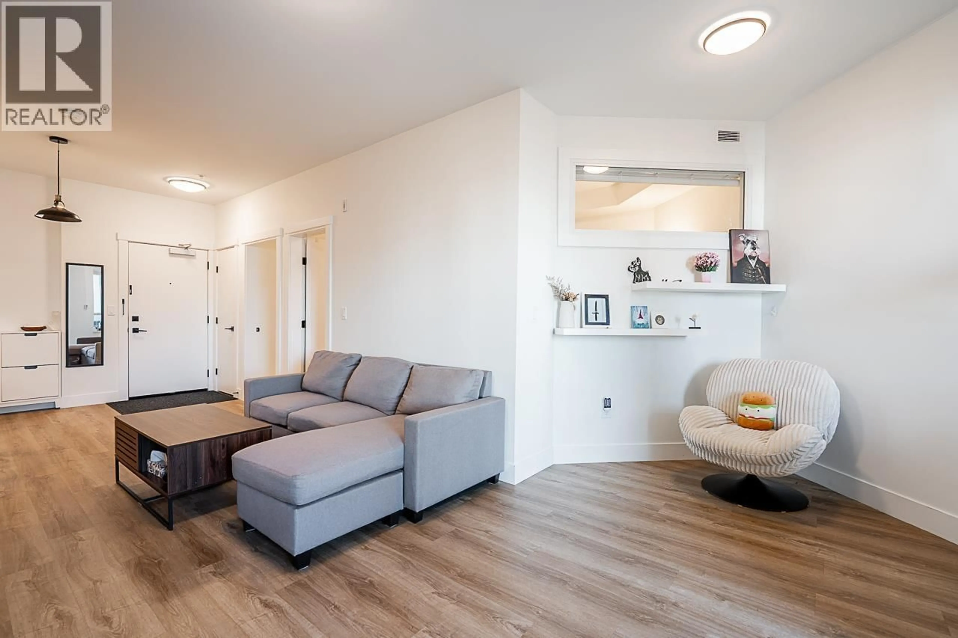 Living room with furniture, unknown for 1608 - 2180 KELLY AVENUE, Port Coquitlam British Columbia V3C0S6