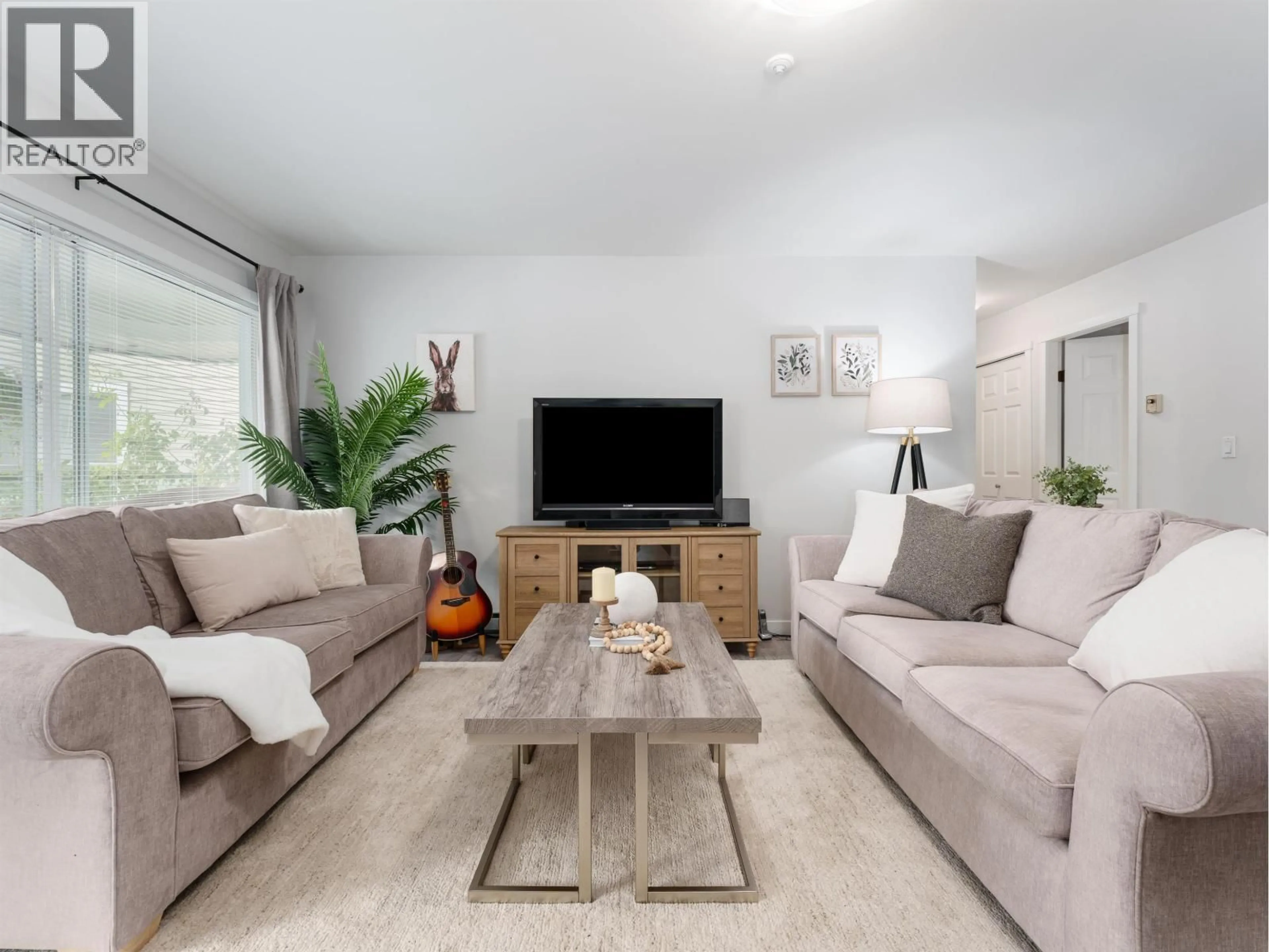 Living room with furniture, unknown for 212 - 3690 BANFF COURT, North Vancouver British Columbia V7H2Y7