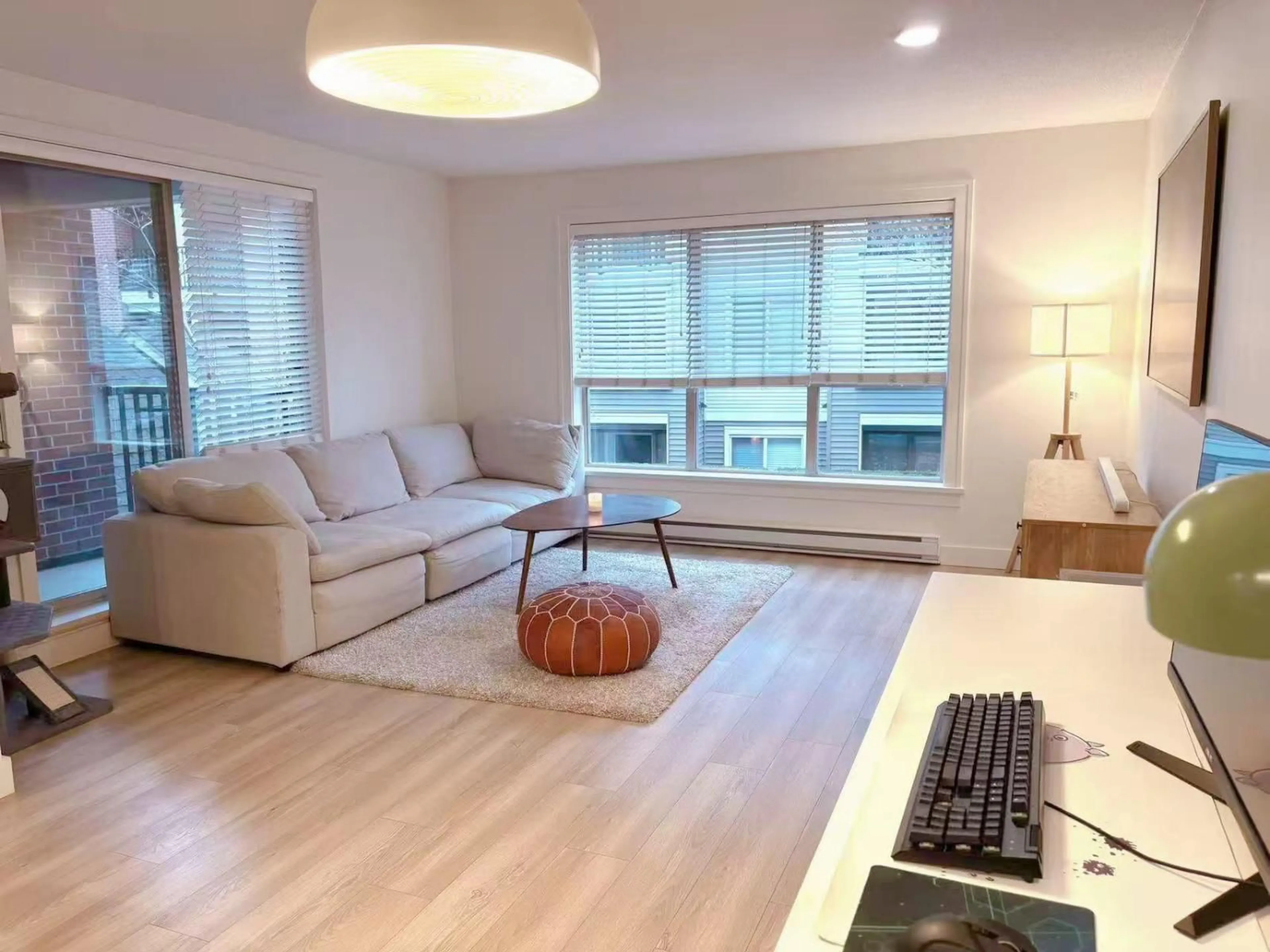 Living room with furniture, wood/laminate floor for A201 - 8929 202 STREET, Langley British Columbia V1M0B4