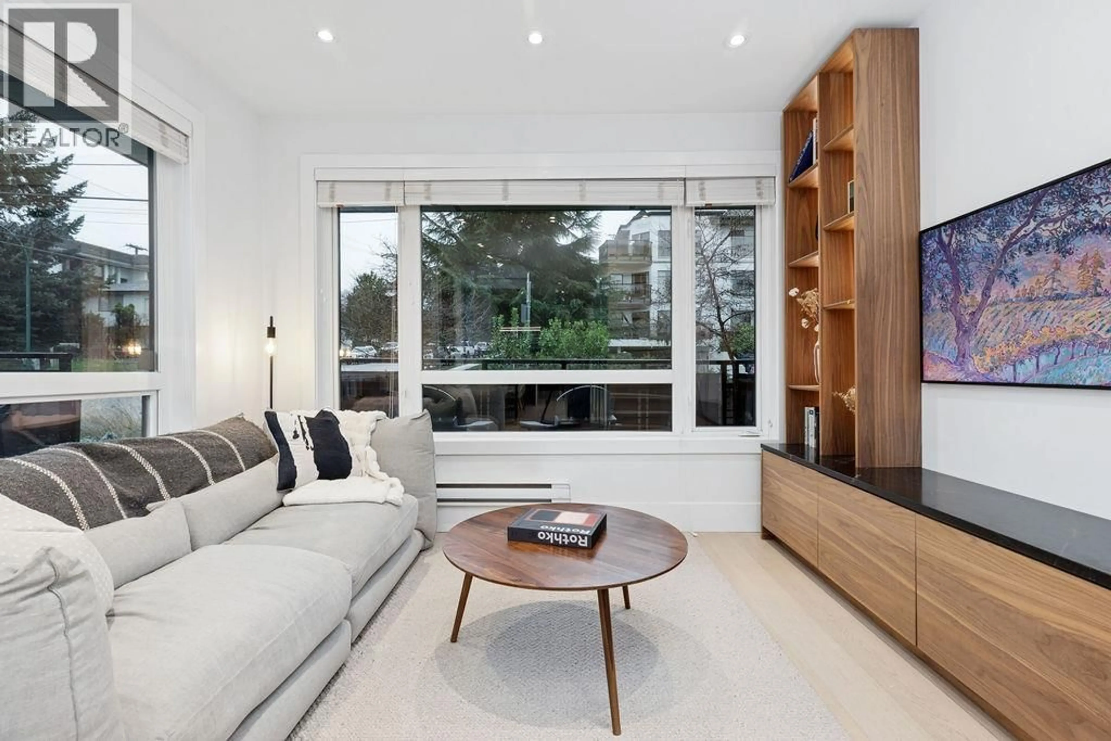 Living room with furniture, wood/laminate floor for 2175 GUELPH STREET, Vancouver British Columbia V5T3N7