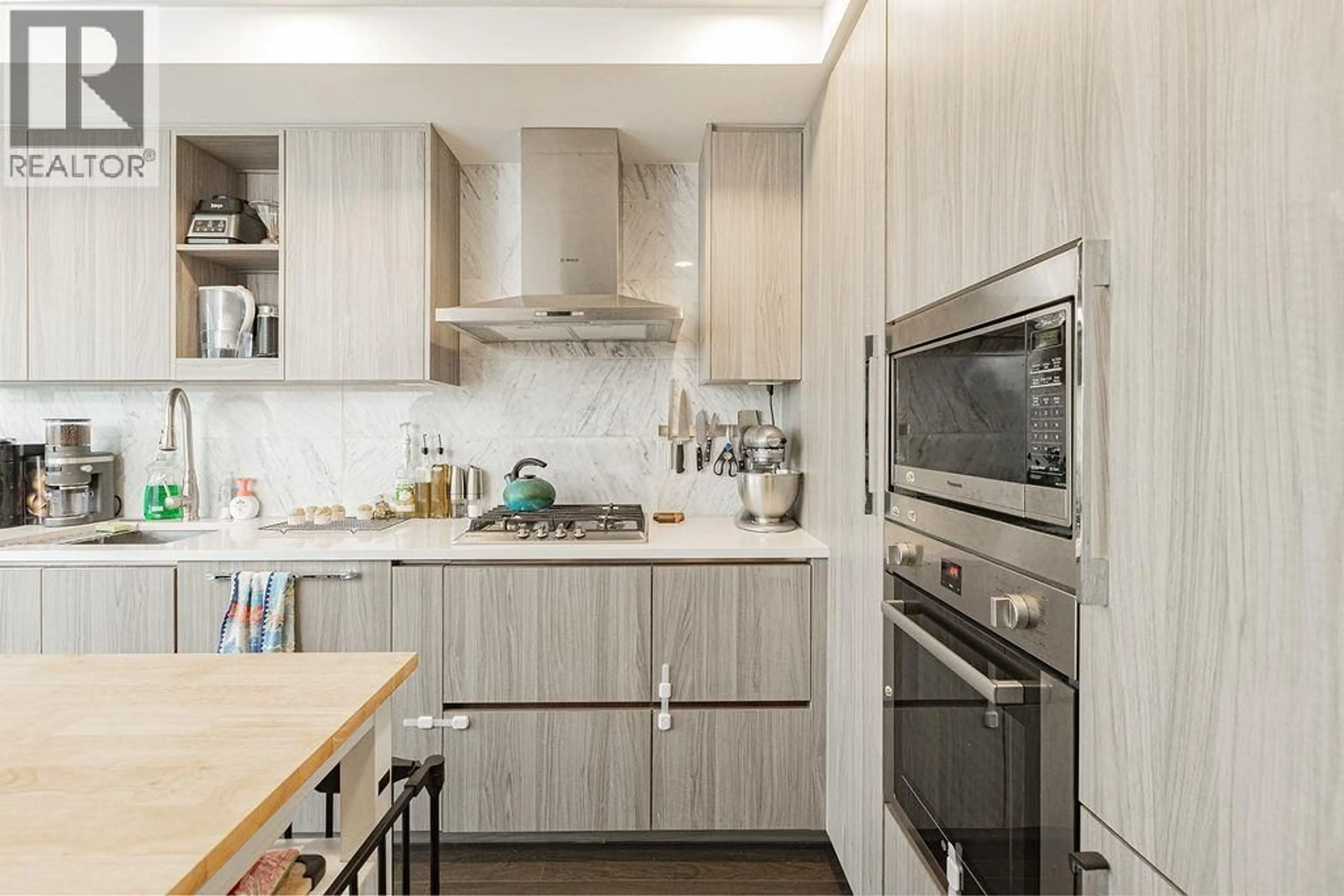 Contemporary kitchen, wood/laminate floor for 608 - 3300 KETCHESON ROAD, Richmond British Columbia V6X0S5