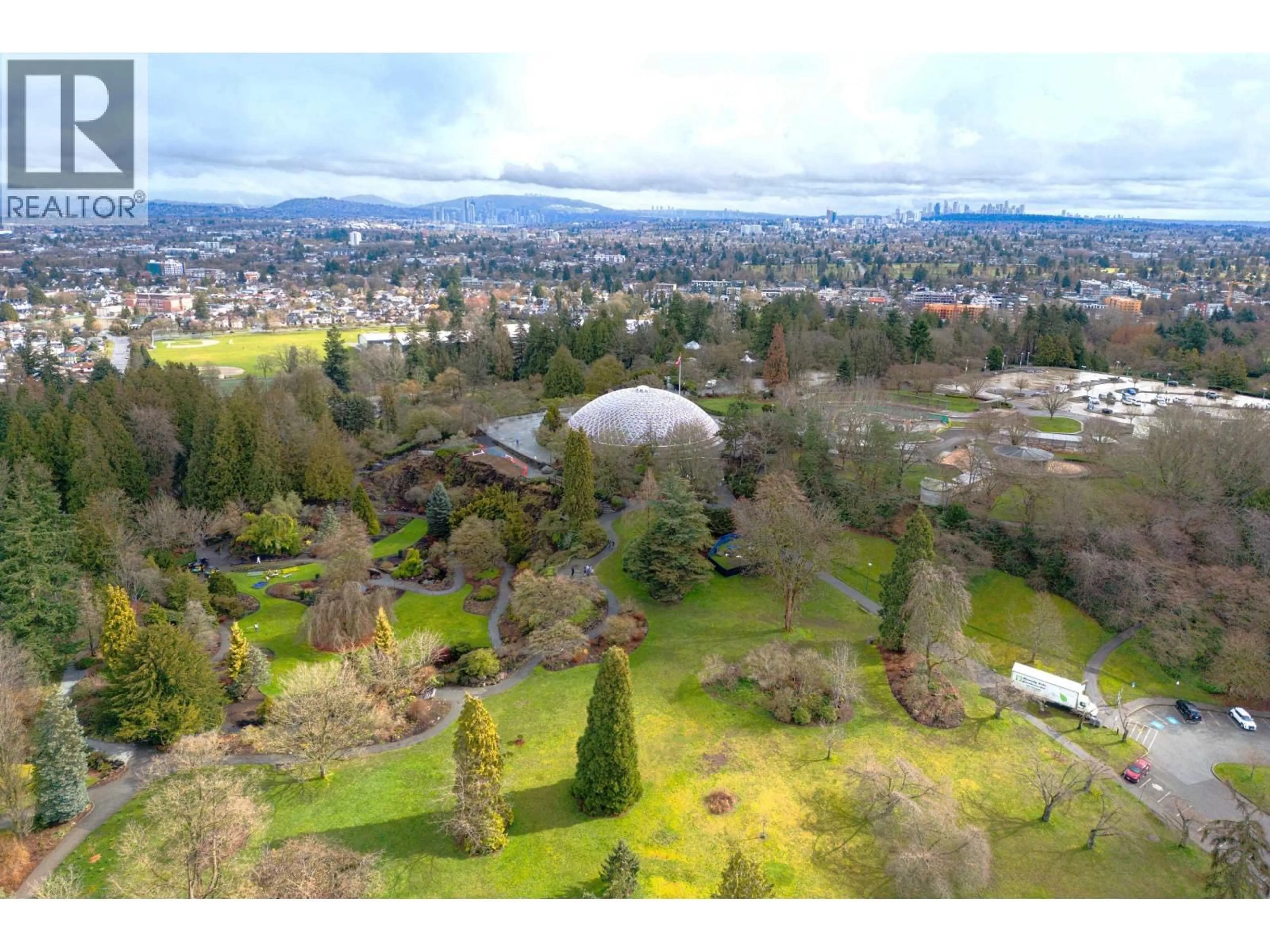 A pic from outside/outdoor area/front of a property/back of a property/a pic from drone, mountain view for 104 - 4932 CAMBIE STREET, Vancouver British Columbia V5Z0K1