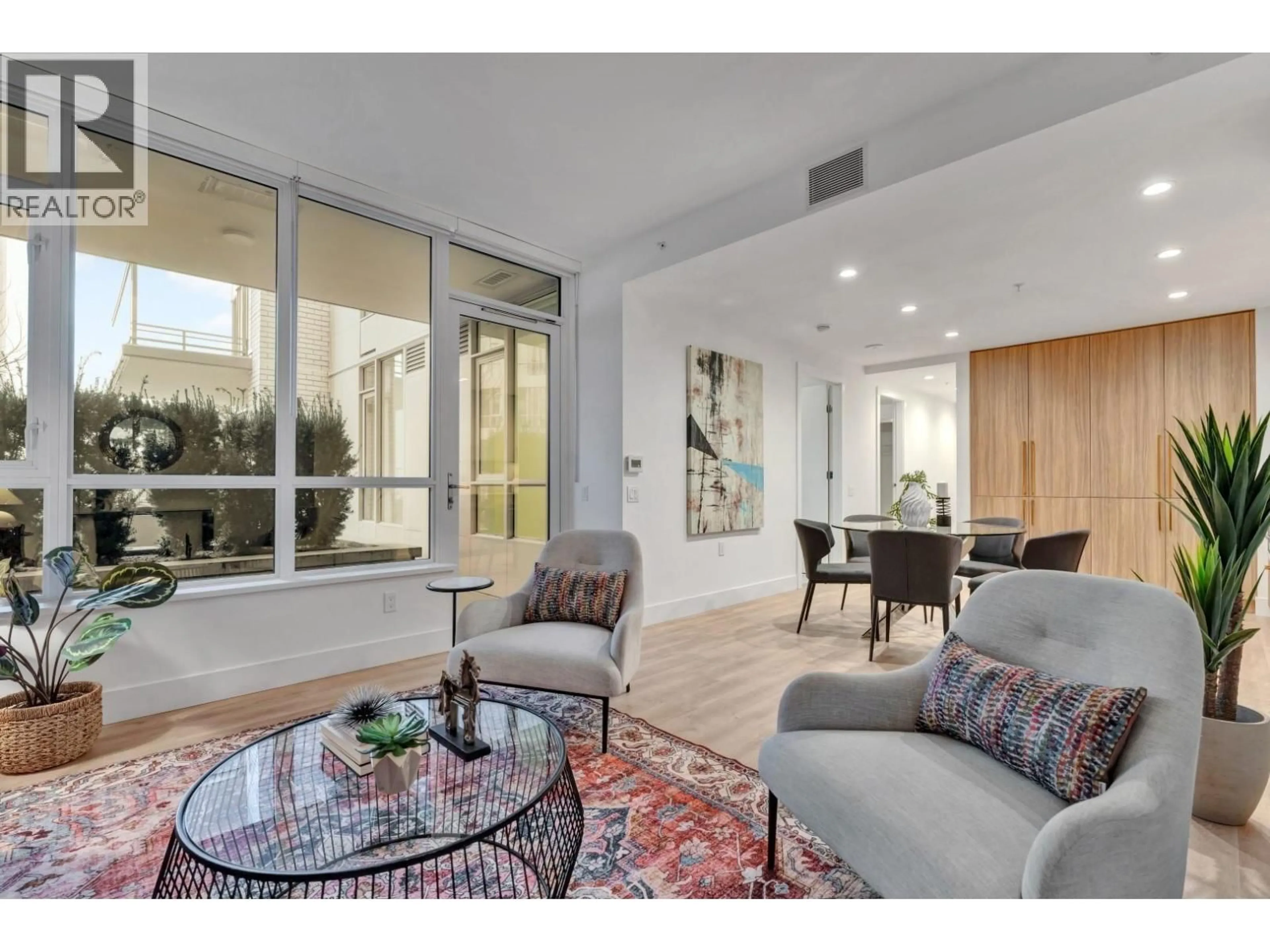 Living room with furniture, unknown for 105 - 2325 EMERY COURT, North Vancouver British Columbia V7J0E8