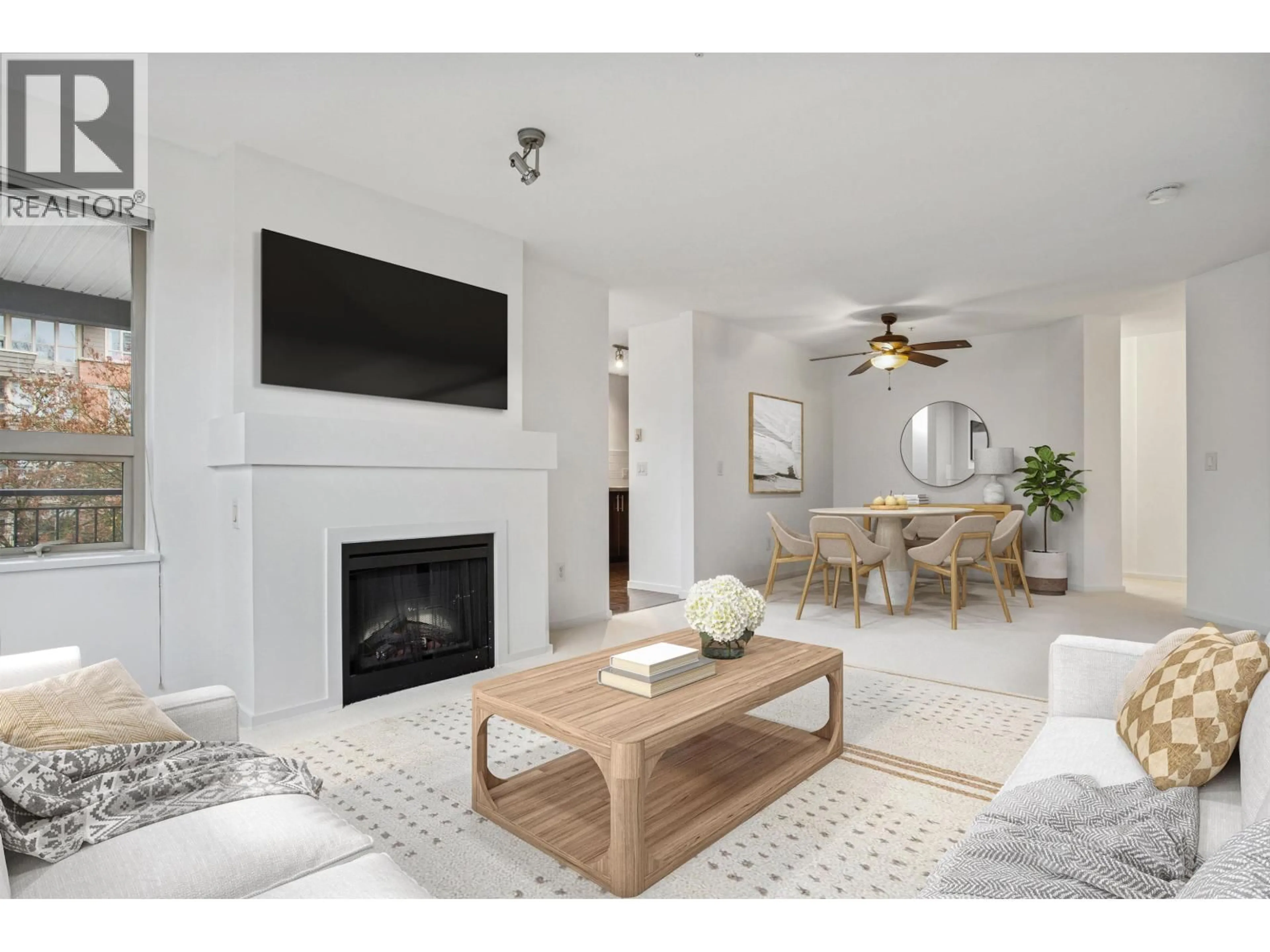 Living room with furniture, unknown for 206 - 700 KLAHANIE DRIVE, Port Moody British Columbia V3H5L3