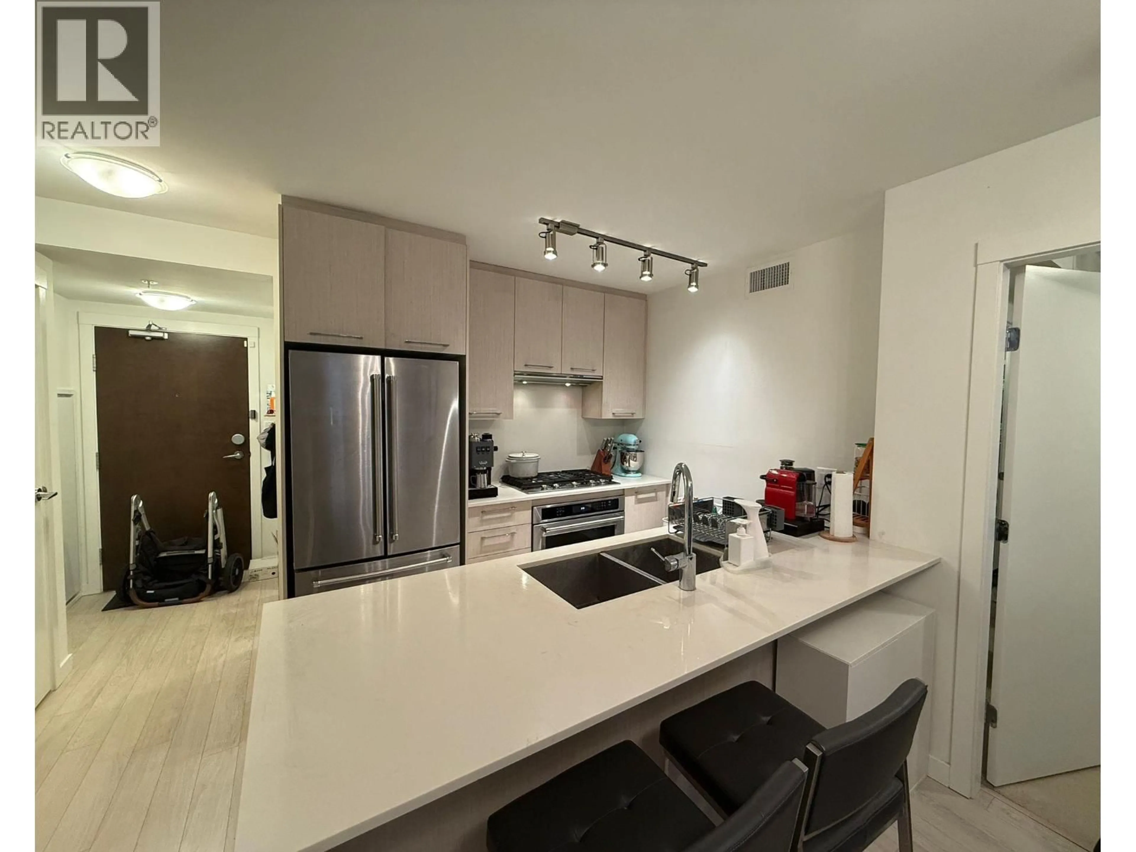 Open concept kitchen, unknown for 306 - 7708 ALDERBRIDGE WAY, Richmond British Columbia V6X0P9