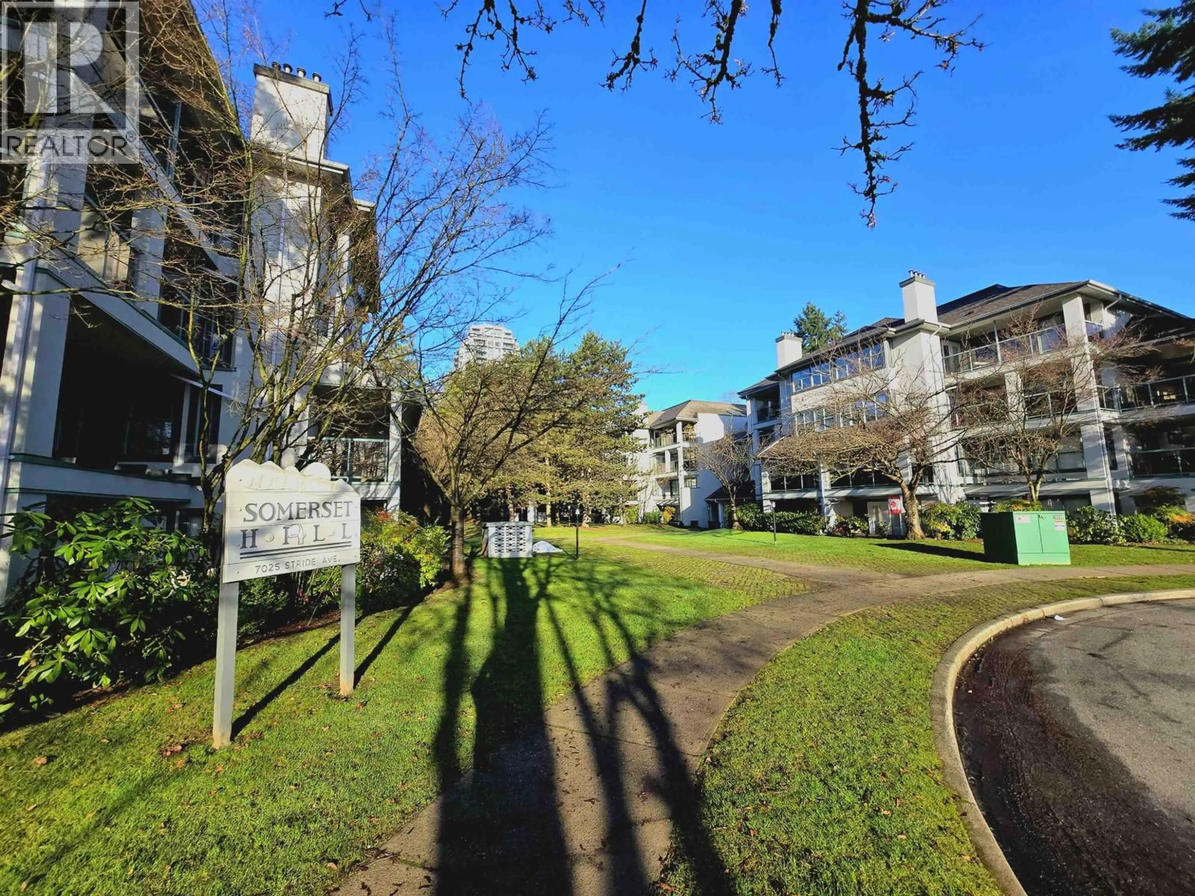 A pic from outside/outdoor area/front of a property/back of a property/a pic from drone, street for 103B - 7025 STRIDE AVENUE, Burnaby British Columbia V3N4Y1