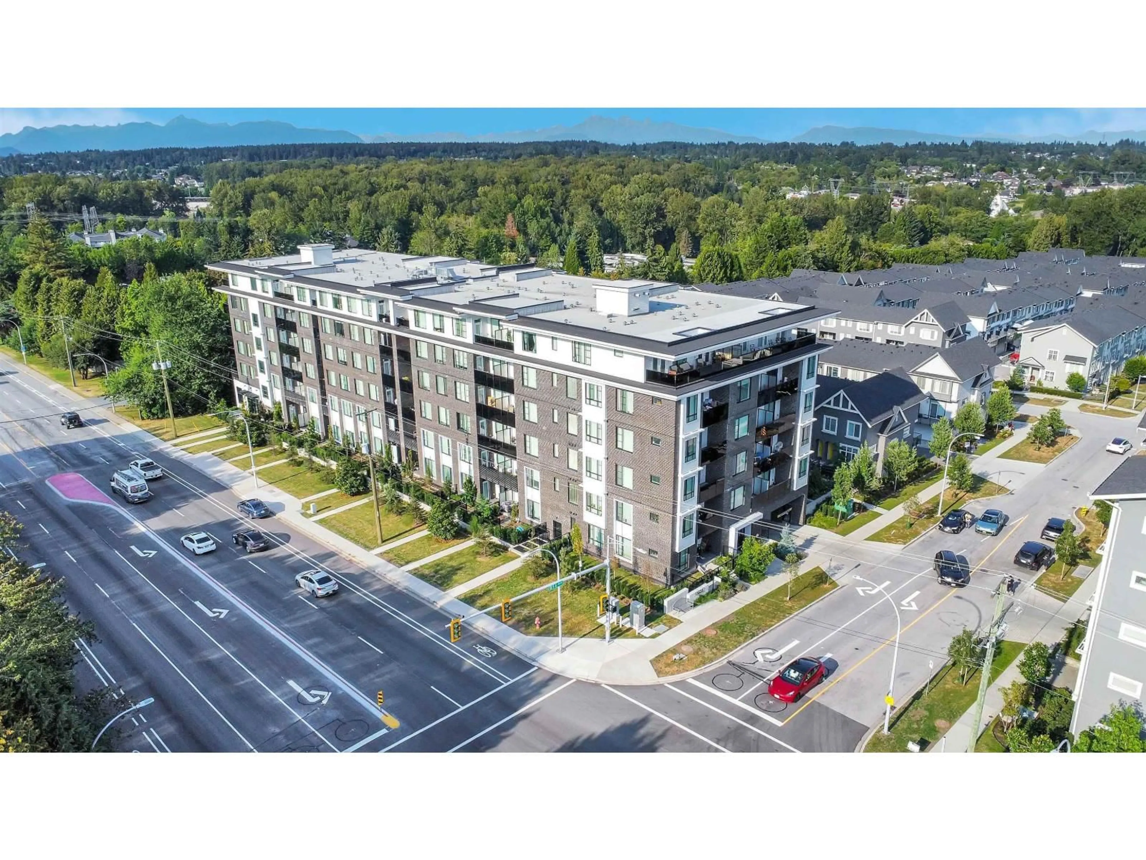 A pic from outside/outdoor area/front of a property/back of a property/a pic from drone, building for 502 - 13623 81A AVENUE, Surrey British Columbia V3W3N7