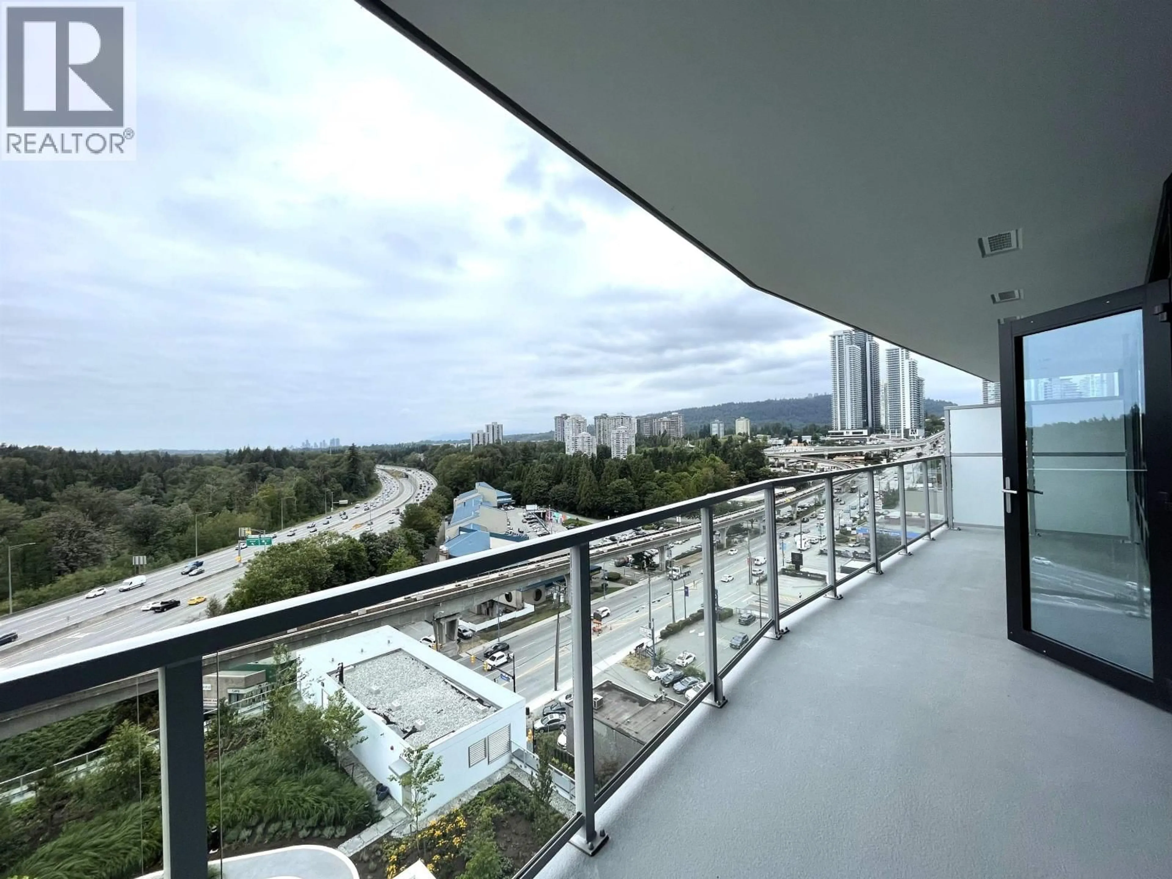 Balcony in the apartment, city buildings view from balcony for 1208 - 318 ALDERSON AVENUE, Coquitlam British Columbia V3K0J1
