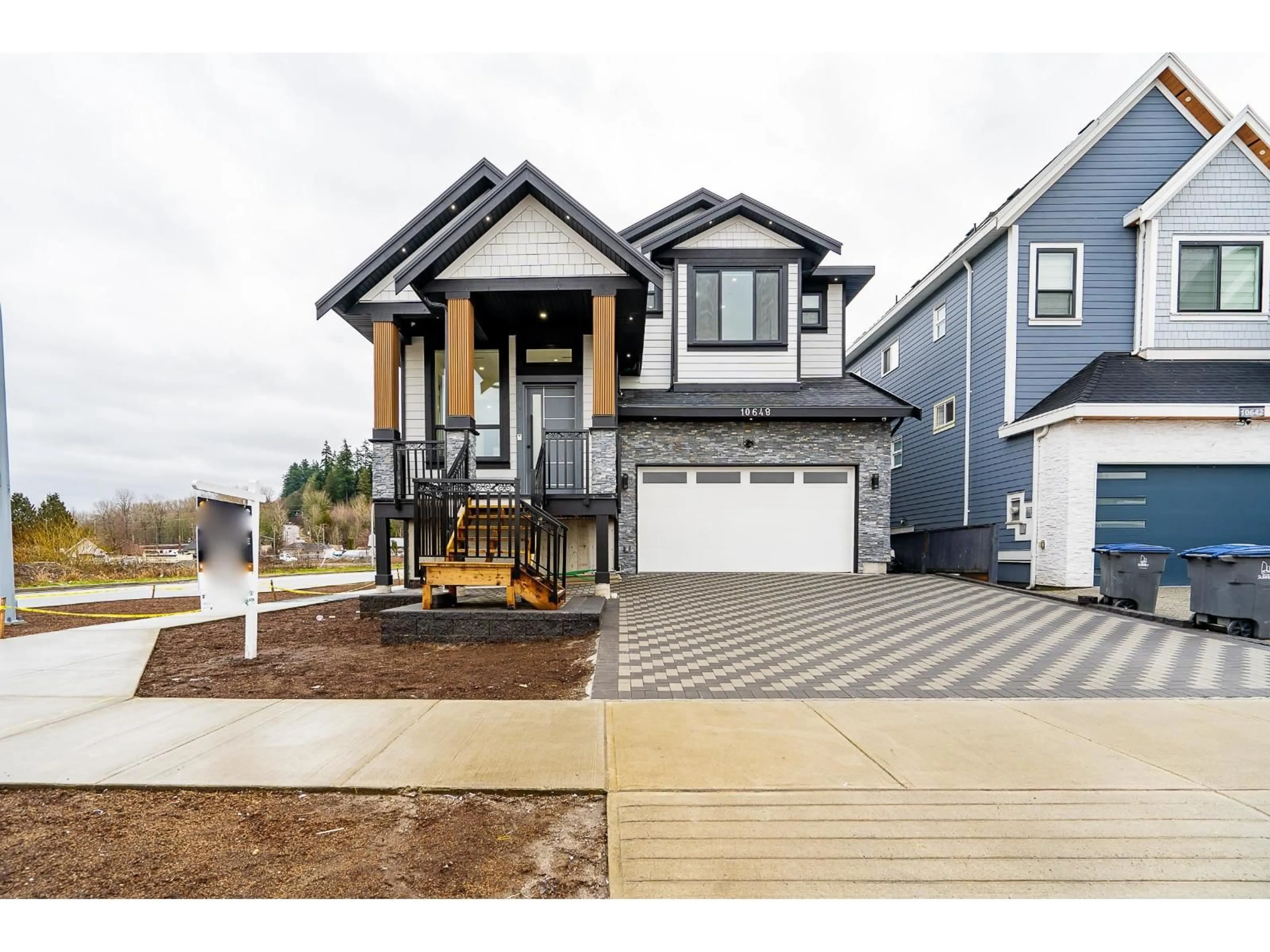 Home with vinyl exterior material, street for 10648 124 STREET, Surrey British Columbia V3V0E2