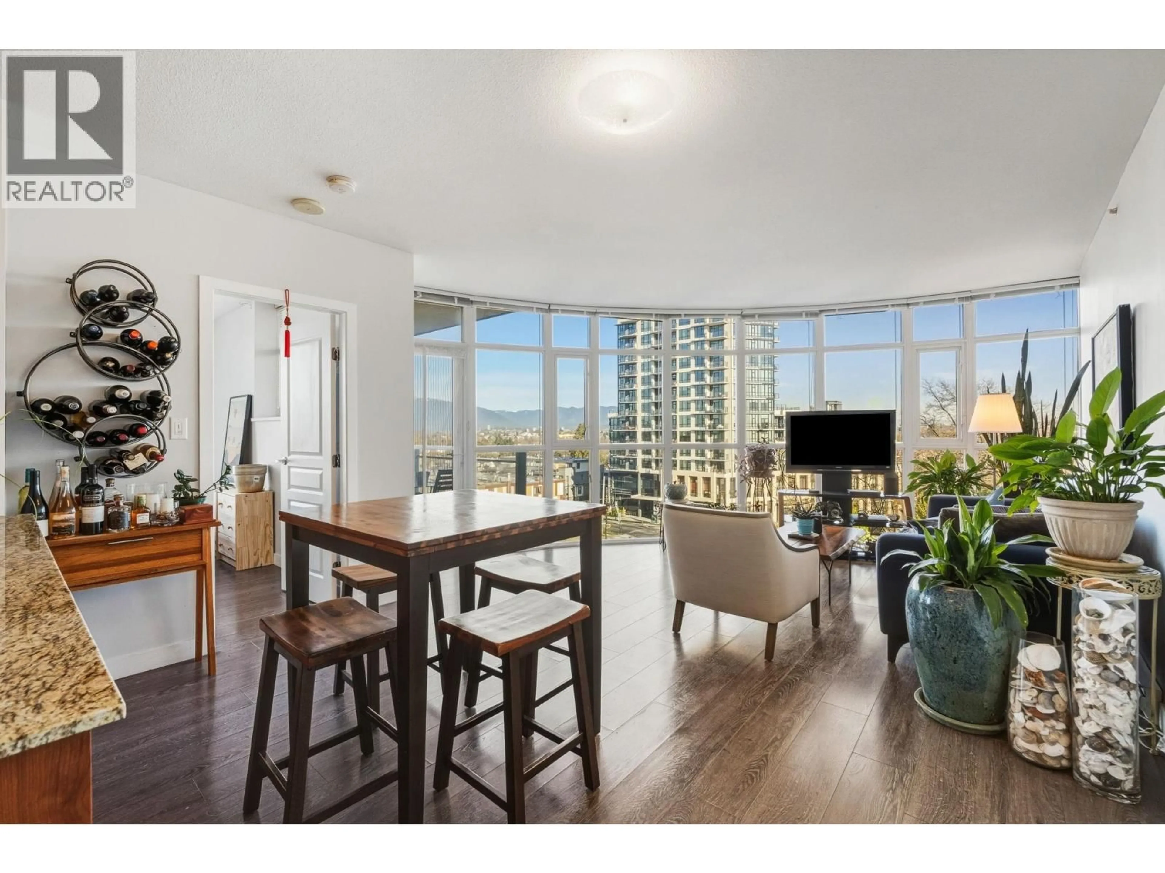 Living room with furniture, wood/laminate floor for 751 - 1483 KING EDWARD AVENUE, Vancouver British Columbia V5N5Z3