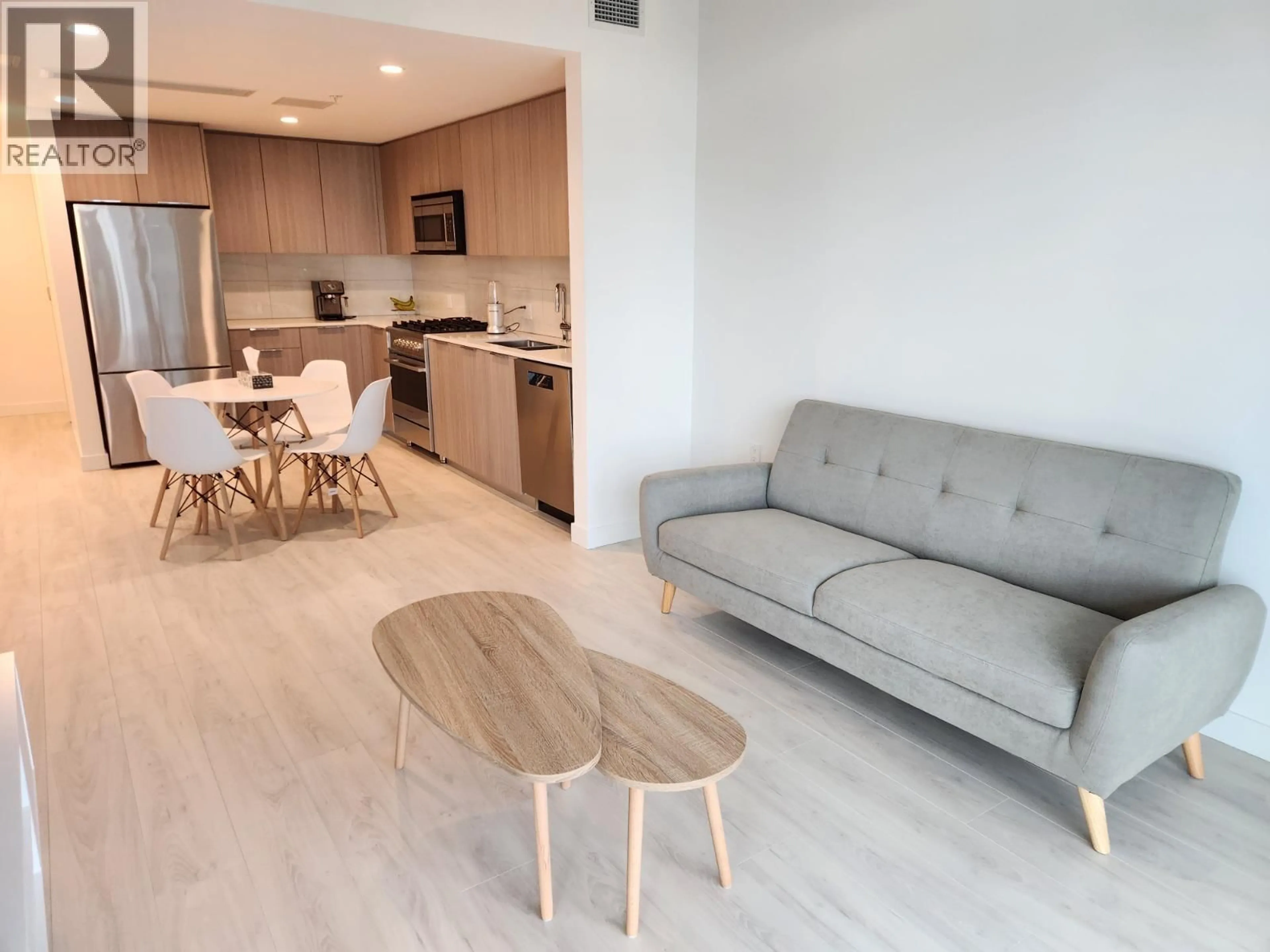 Living room with furniture, unknown for 1002 - 1401 HUNTER STREET, North Vancouver British Columbia V7J0E2