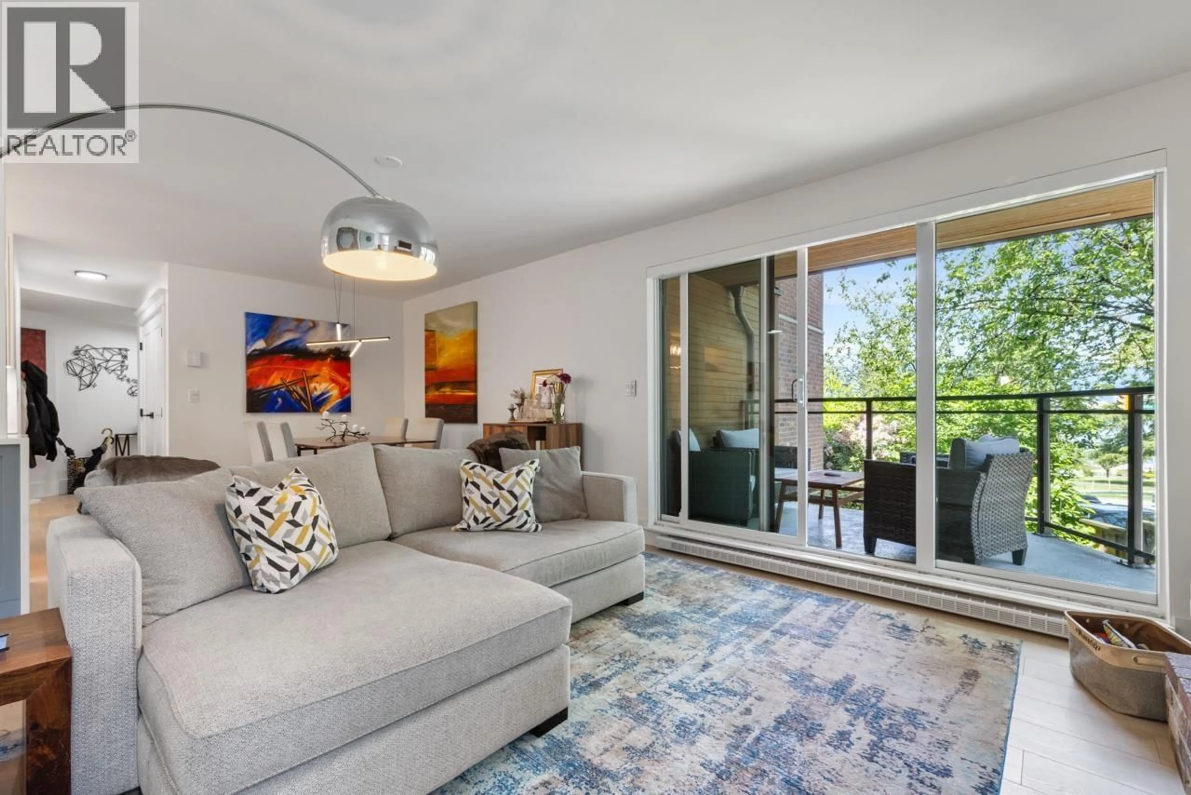 Living room with furniture, unknown for 204 - 2410 CORNWALL AVENUE, Vancouver British Columbia V6K1B8