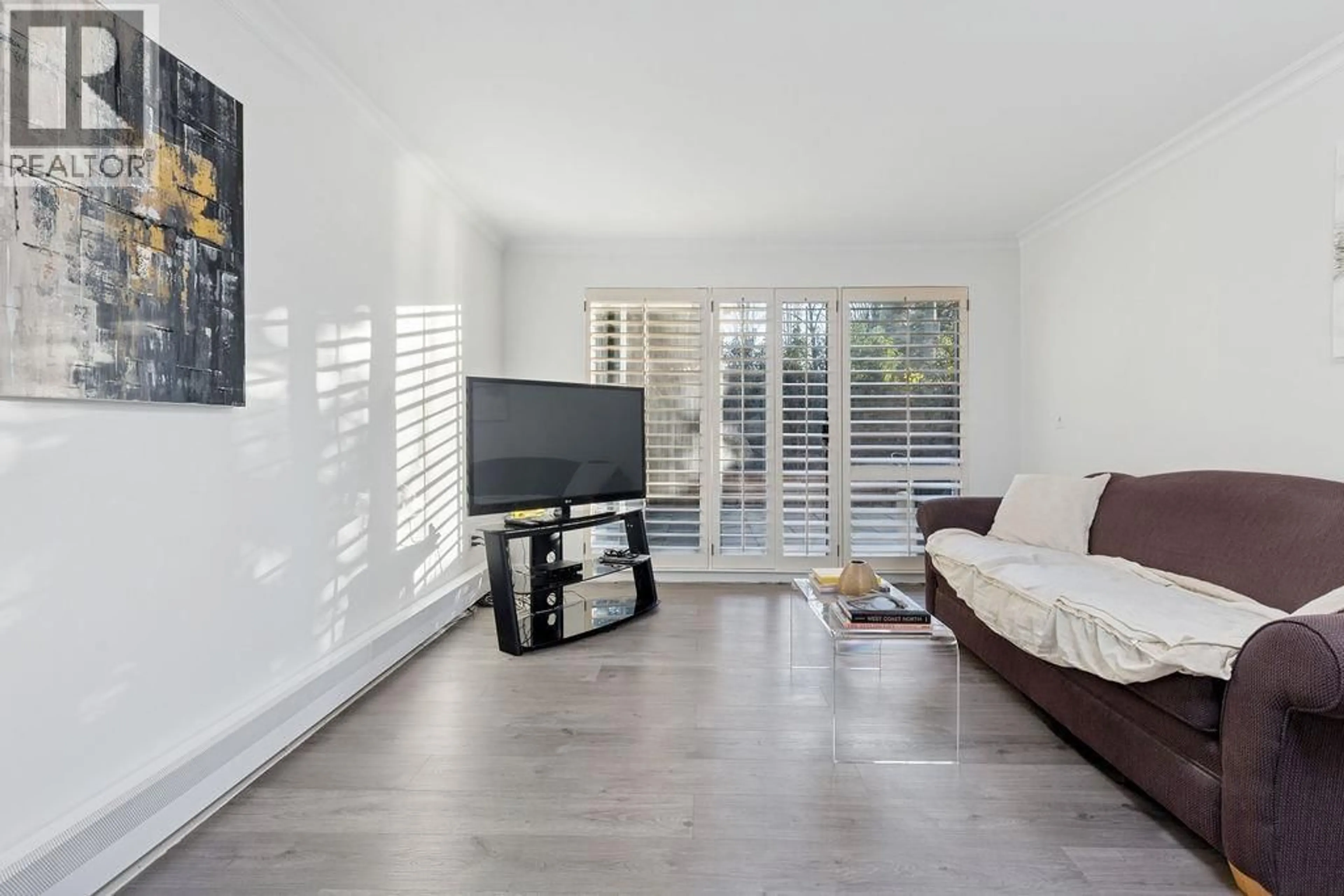 Living room with furniture, unknown for 105 - 3875 4TH AVENUE, Vancouver British Columbia V6R4H8