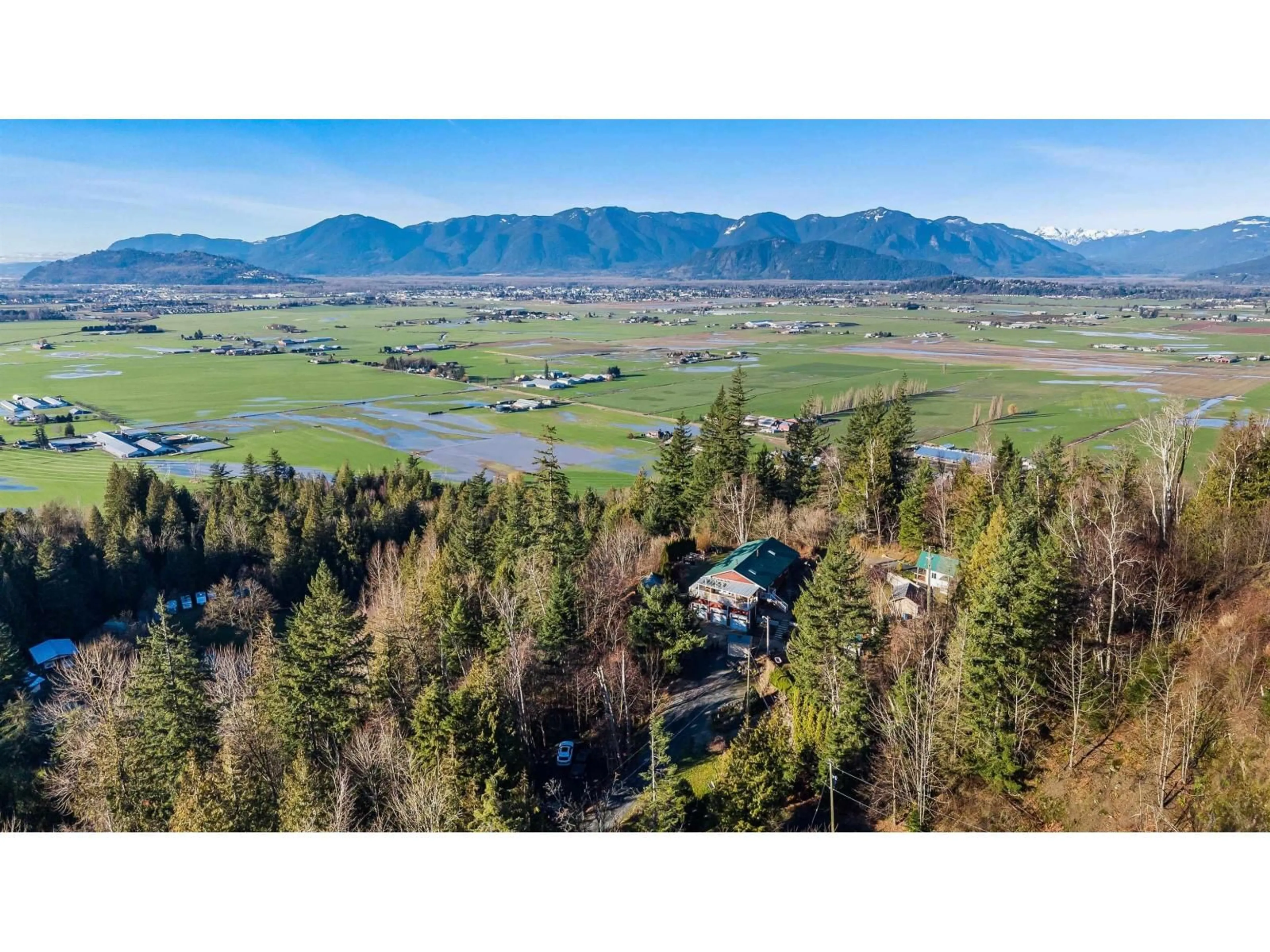A pic from outside/outdoor area/front of a property/back of a property/a pic from drone, mountain view for 48585 WINCOTT ROAD, Ryder Lake British Columbia V4Z1H1