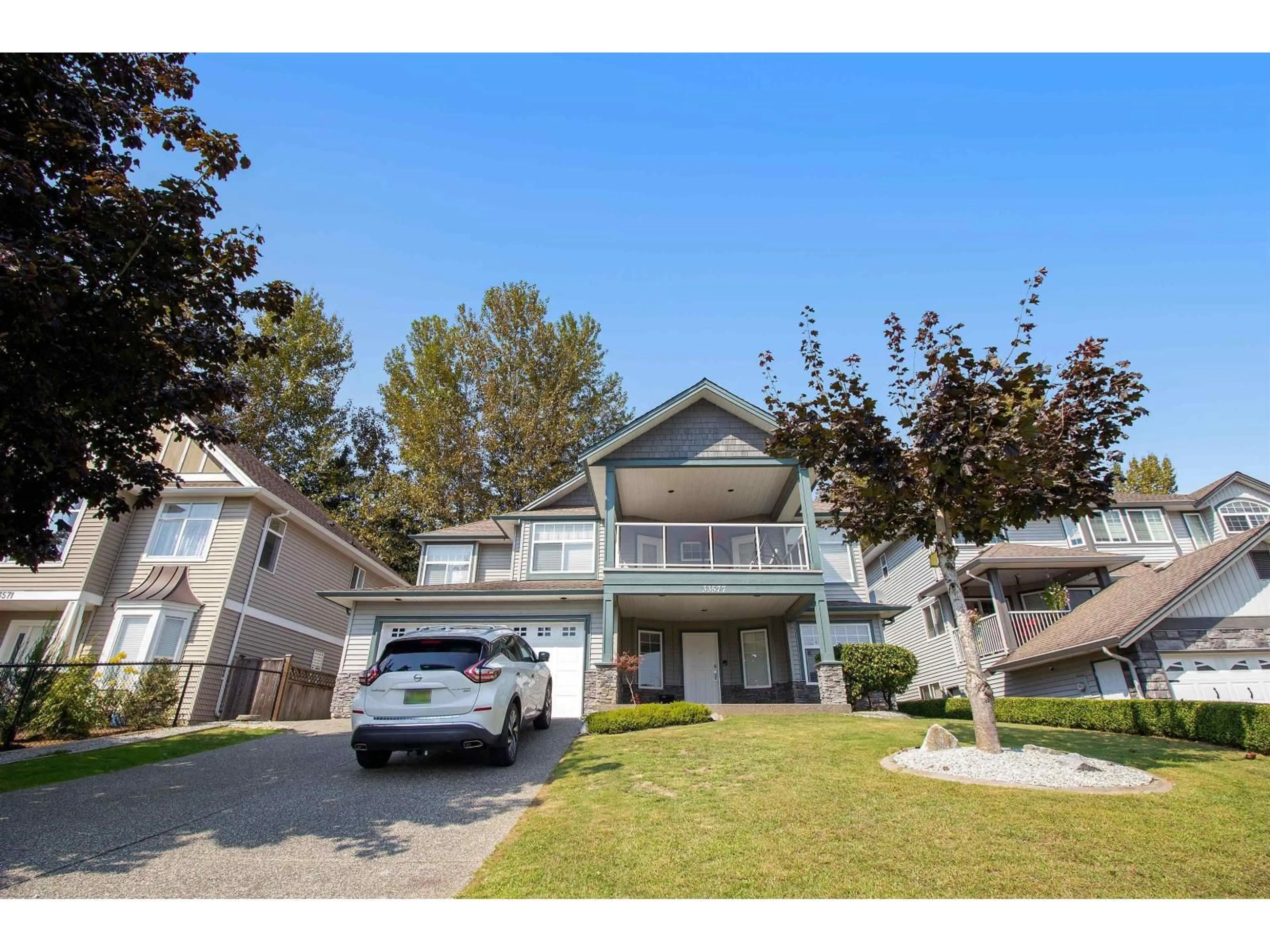 Home with vinyl exterior material, street for 33577 12 AVENUE, Mission British Columbia V2V6Z6