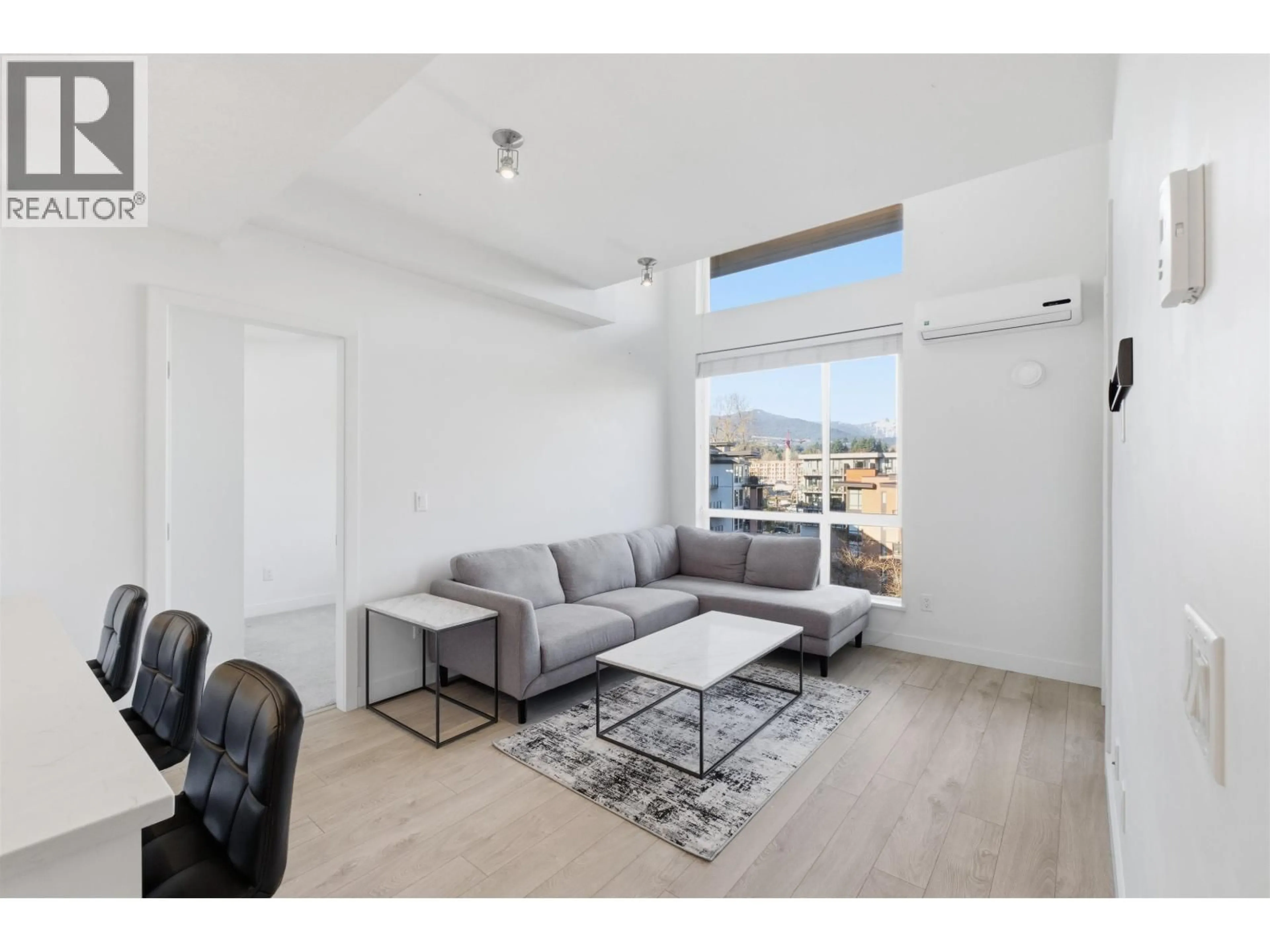 Living room with furniture, unknown for 605 - 719 3RD STREET, North Vancouver British Columbia V7M0E7