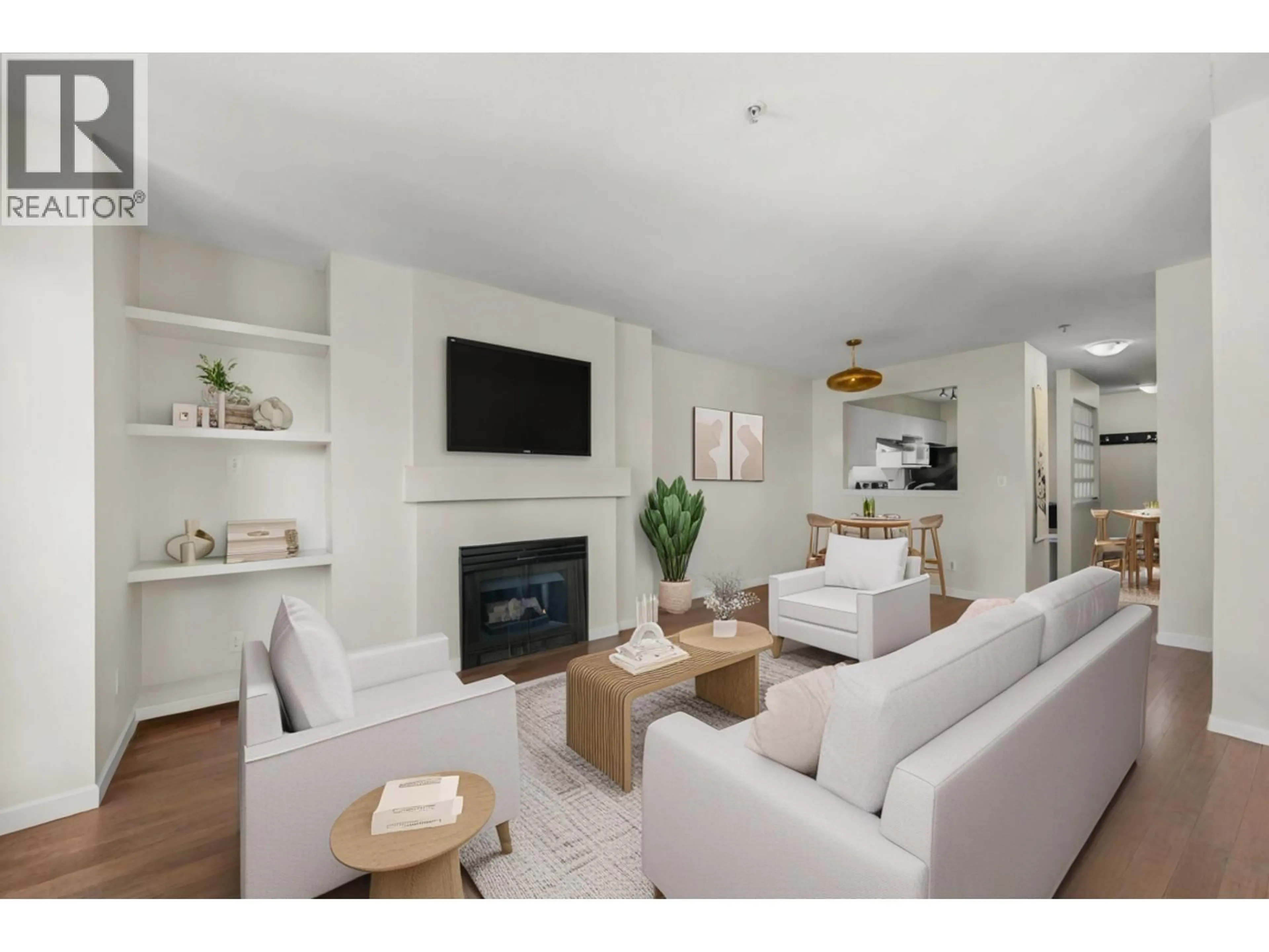 Living room with furniture, wood/laminate floor for 202 - 1333 7TH AVENUE, Vancouver British Columbia V6H1B8