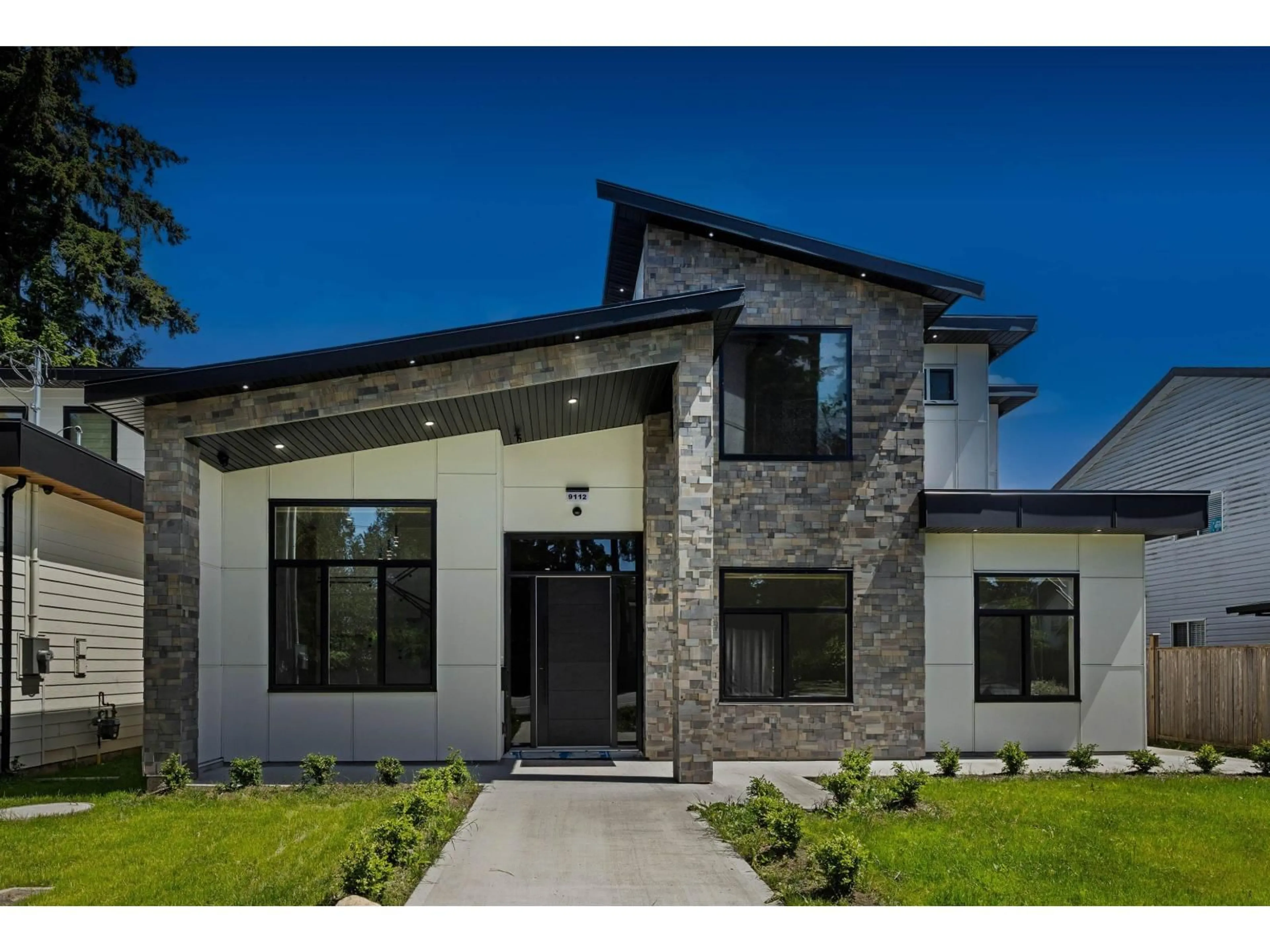 Home with brick exterior material, street for 9112 156 STREET, Surrey British Columbia V3R5Y8