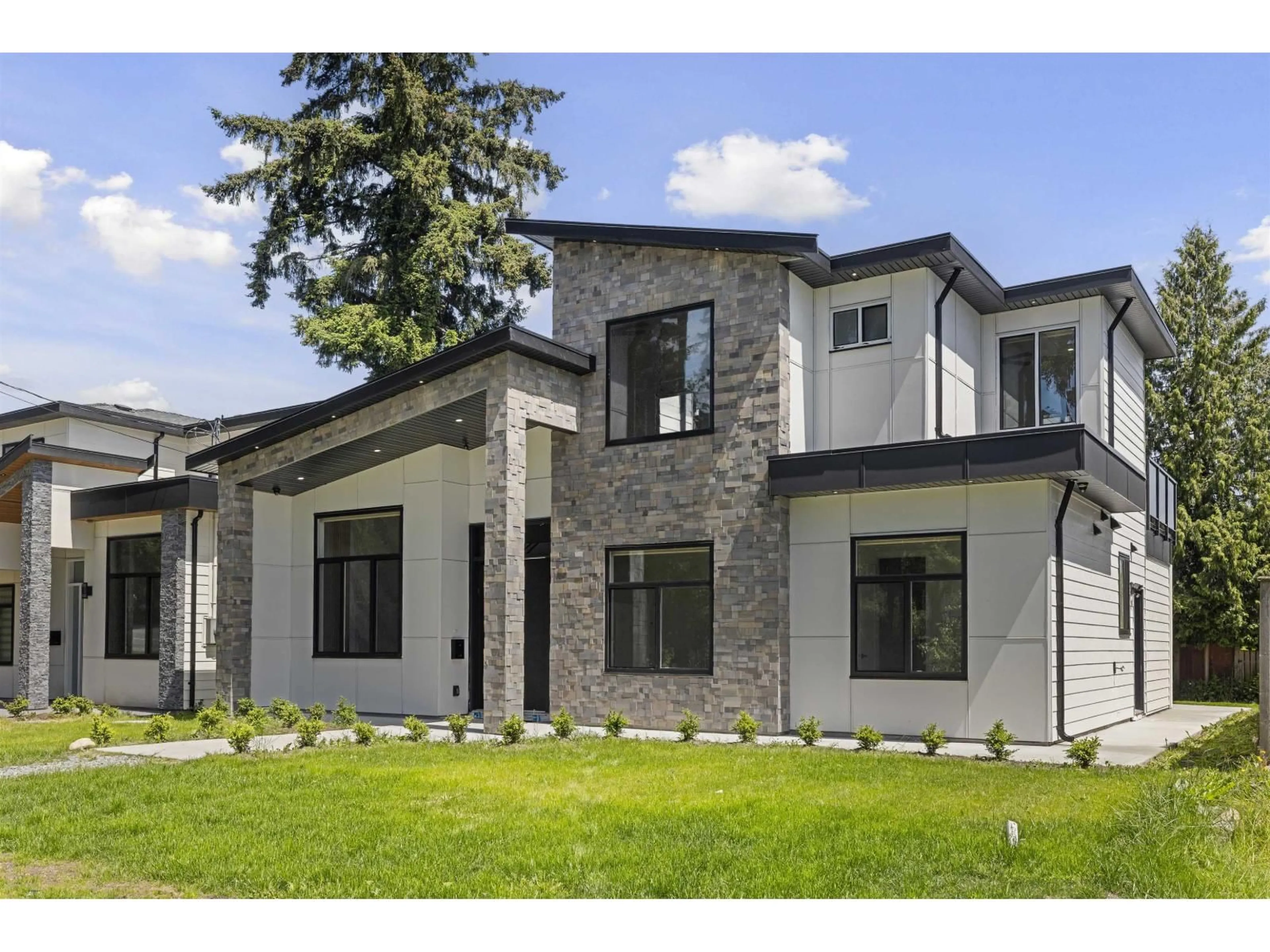 Home with brick exterior material, unknown for 9112 156 STREET, Surrey British Columbia V3R5Y8